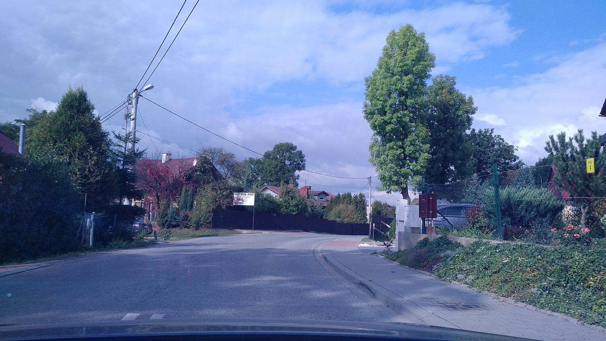 Street view near Sylwester Szumiec FHU Honey Hostel, Modlnica — © quido (CC BY-SA · Mapillary)