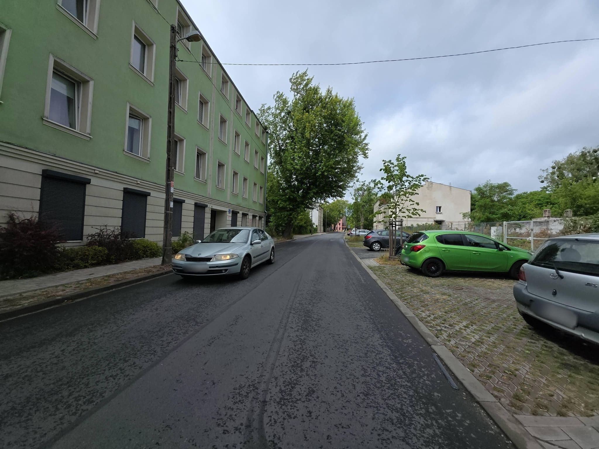 Street view near The Apartments Manufaktura, Łódź — © Rowerowa_Lodz (CC BY-SA · Mapillary)