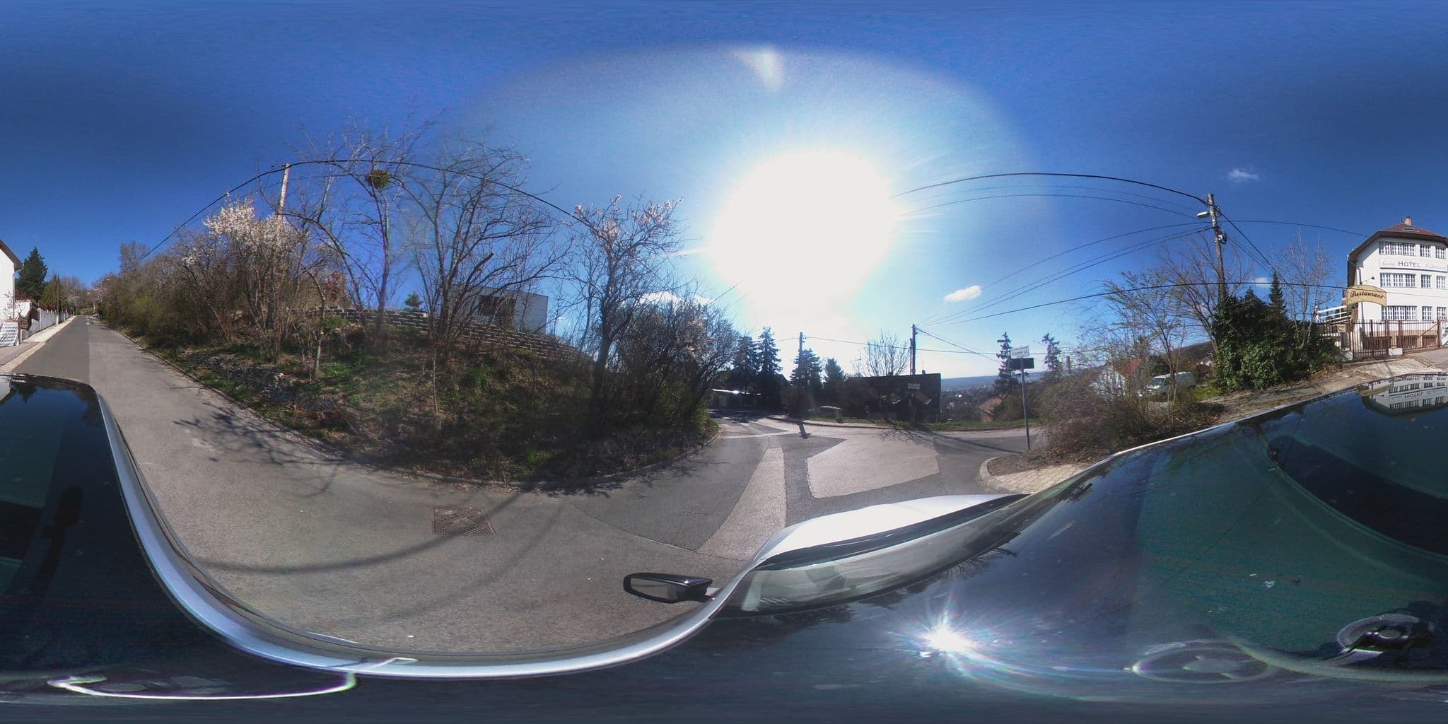 Street view near Budai Zöldövezet Apartmanház és Rendezvény Központ, Mártonhegy — © kami911 (CC BY-SA · Mapillary)