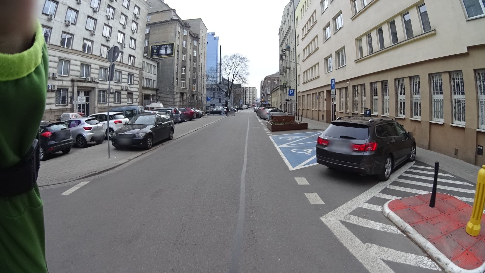 Street view near Apartments in Warsaw Centre, Warsaw — © awizonosz (CC BY-SA · Mapillary)