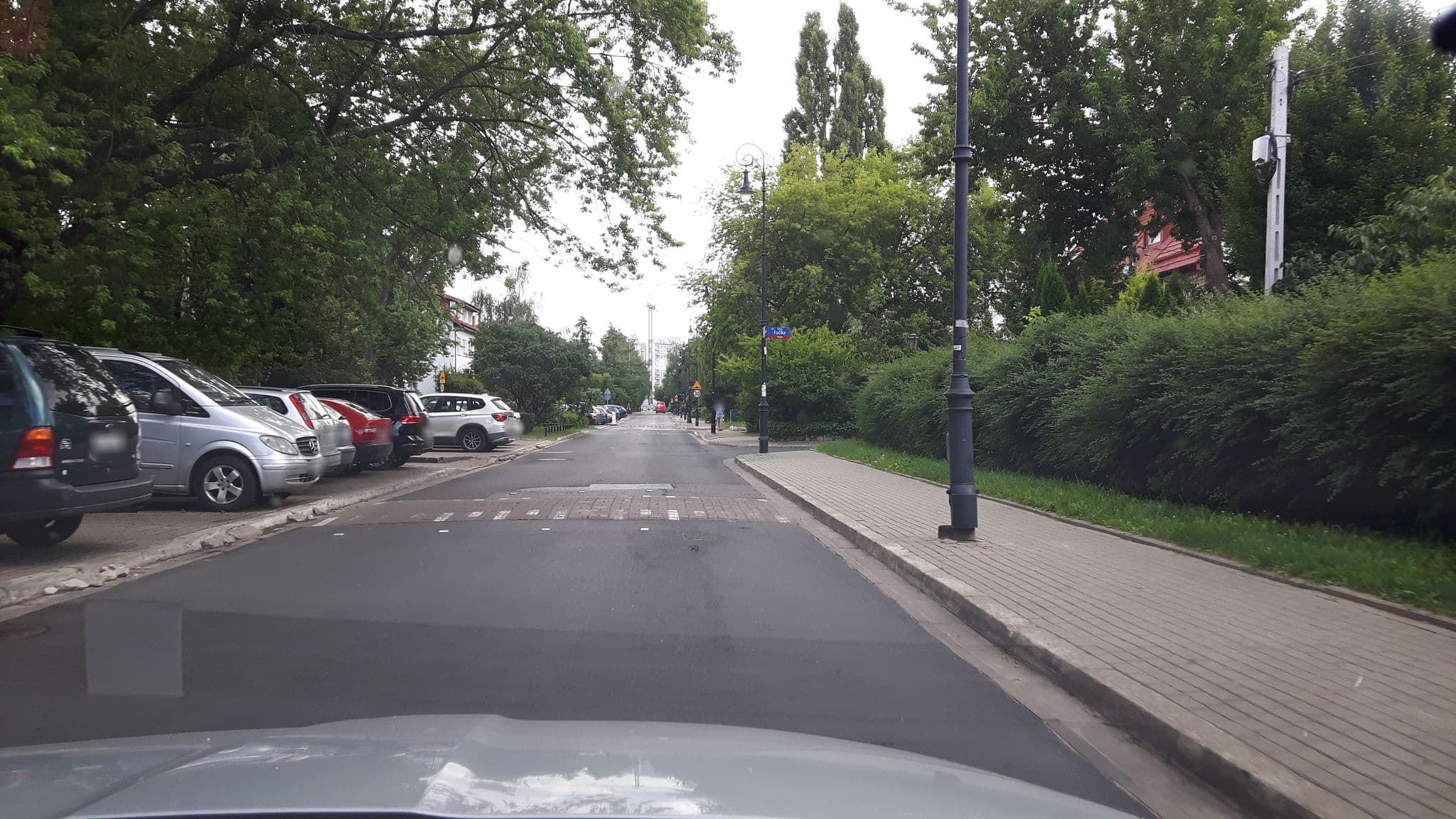 Street view near Sadyba Residence, Mokotów — © andpol_2288 (CC BY-SA · Mapillary)