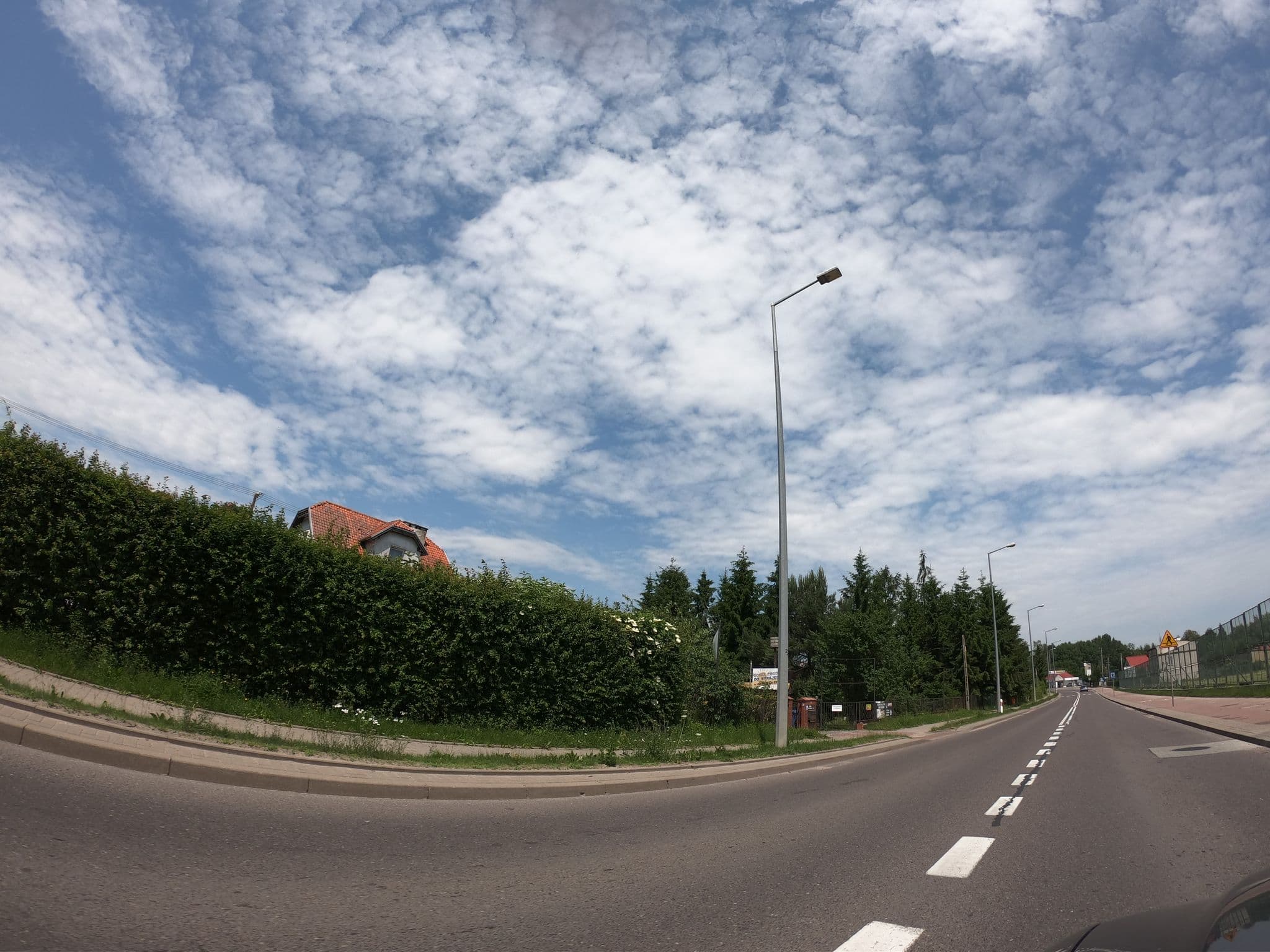 Street view near Andrzej Paszkiewicz Przedsiębiorstwo Handlowo - Gastronomiczne I Obsługi Ruchu Turystycznego, Usługi Budowlane I Transportowe "MARGOT-BIS", Giżycko — © richlv (CC BY-SA · Mapillary)