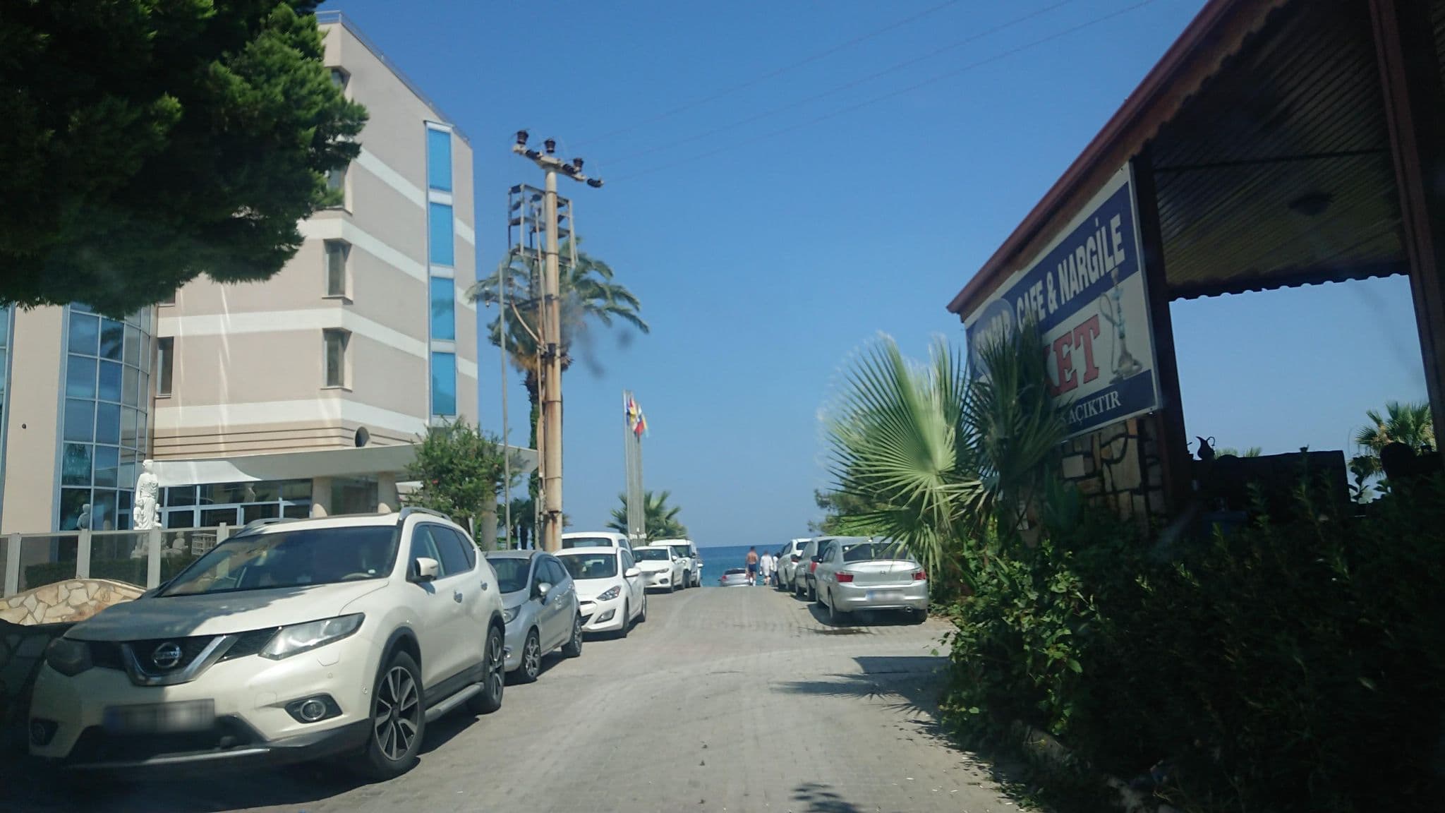 Street view near La Perla Beach Hotel, Güzelçamlı — © kubikanber (CC BY-SA · Mapillary)