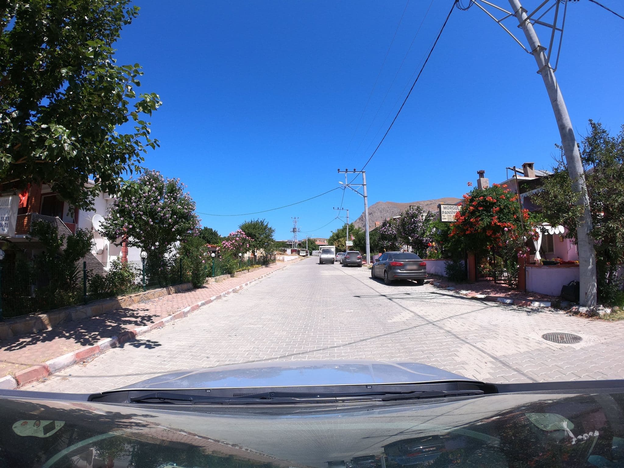 Street view near Melanur Apart 🕸, Gökçeada — © asturksever (CC BY-SA · Mapillary)