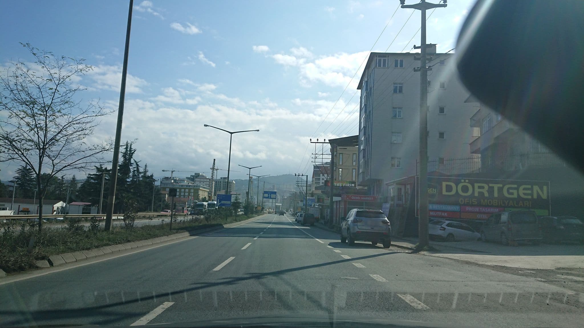 Street view near Defne Gold Suite Hotel, Yomra — © kubikanber (CC BY-SA · Mapillary)