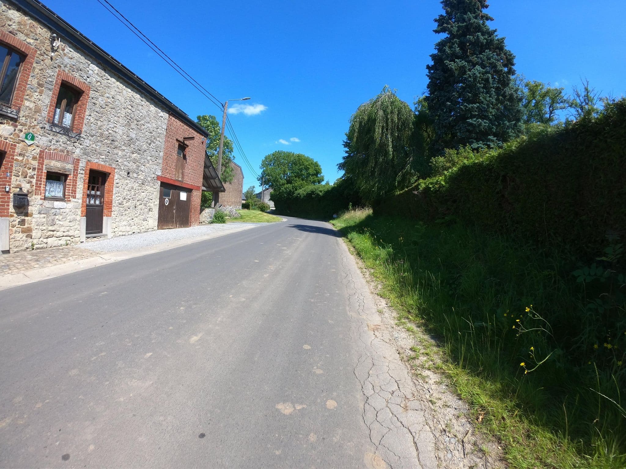 Street view near Rowe Dè Bati 5, Bomal — © joostjakob (CC BY-SA · Mapillary)