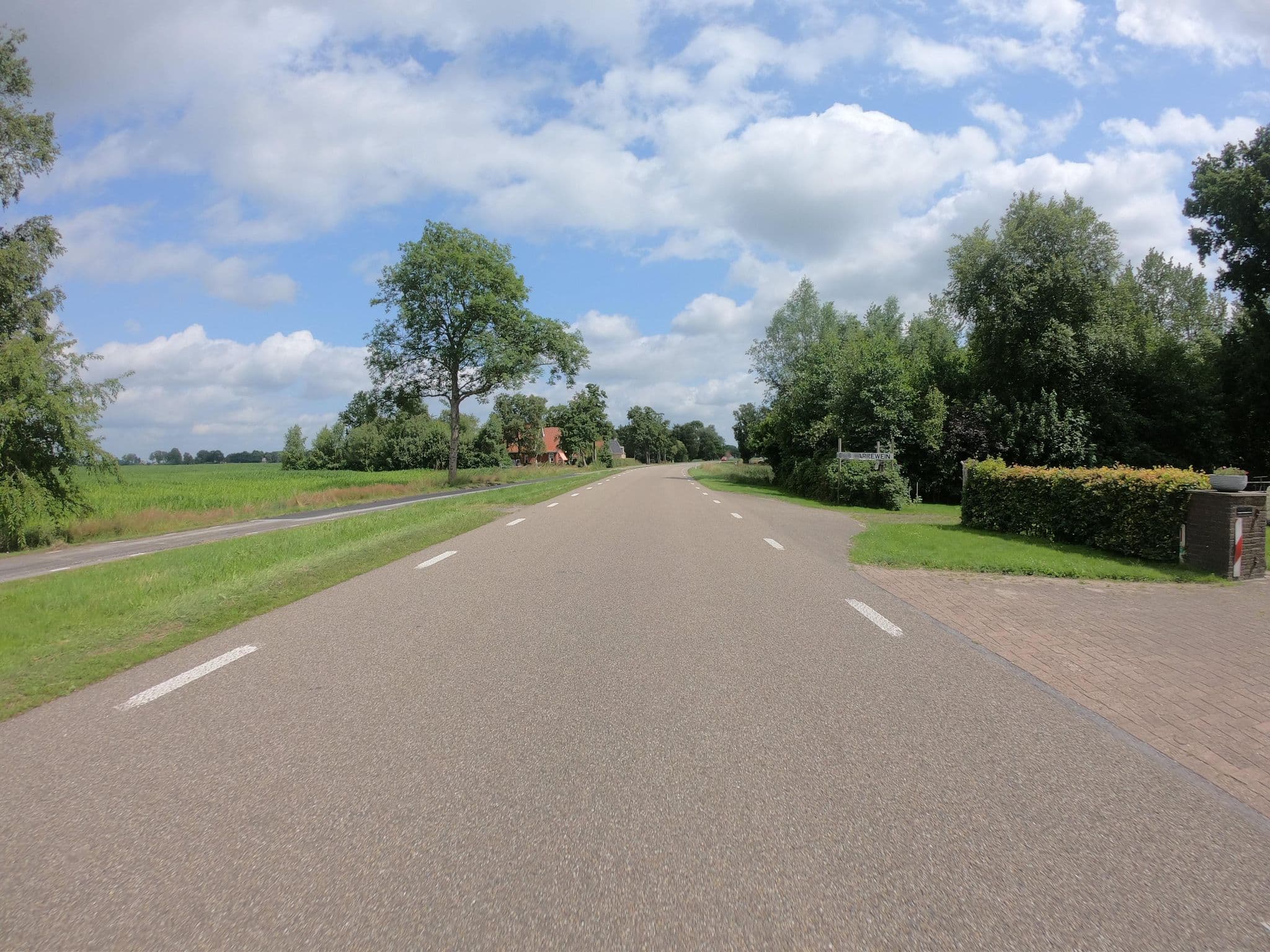Street view near Bed & Brochje De Warreweide, Tijnje — © joostjakob (CC BY-SA · Mapillary)