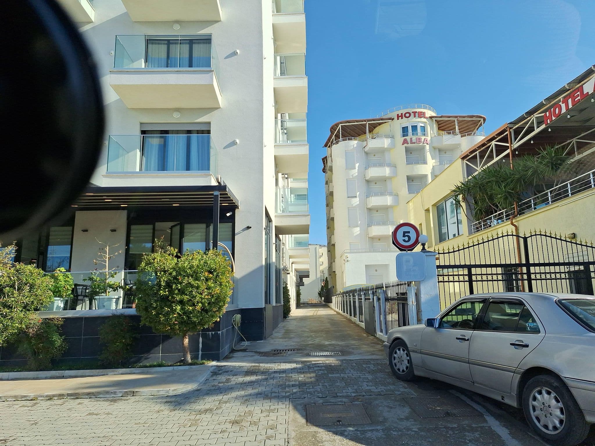 Street view near Triumf Hotel, Shëngjin — © denisju_osm (CC BY-SA · Mapillary)
