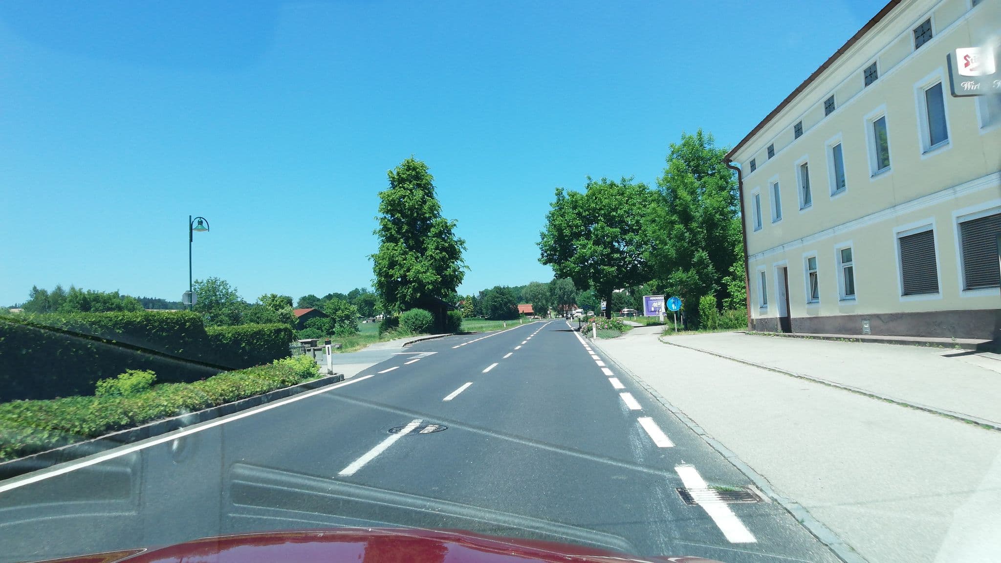 Street view near Gasthaus Wirt in Holzham, Schwanenstadt — © gzin (CC BY-SA · Mapillary)