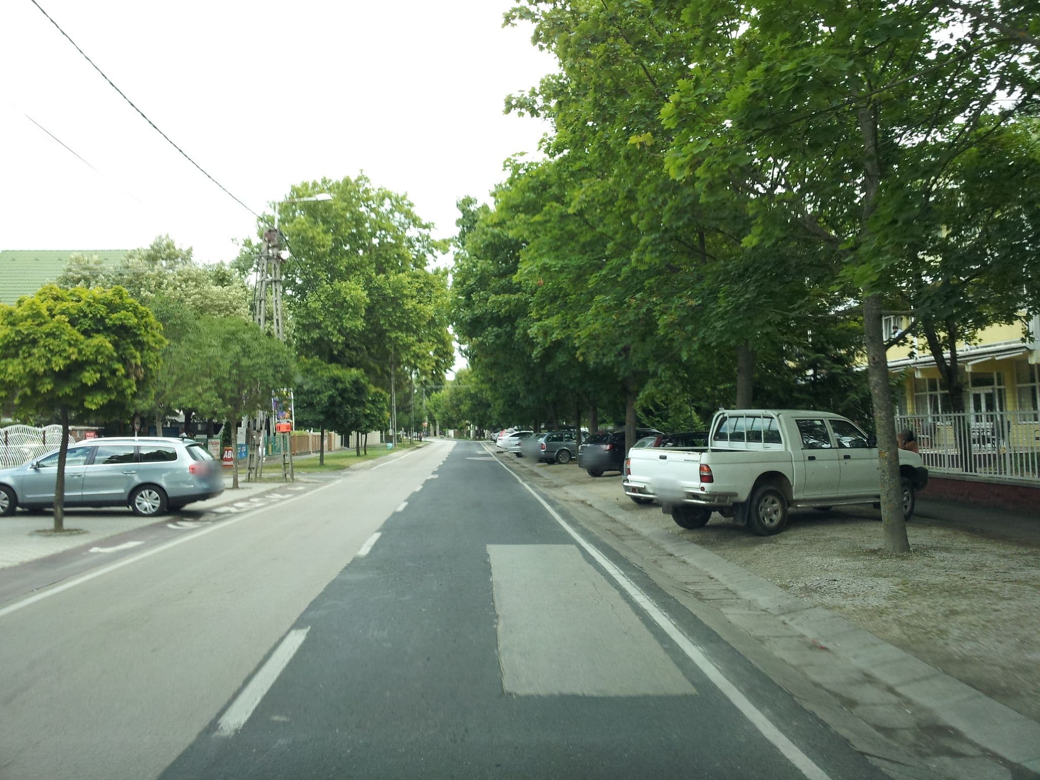 Street view near Hotel Natura Siófok, Siófok — © kolesajr (CC BY-SA · Mapillary)