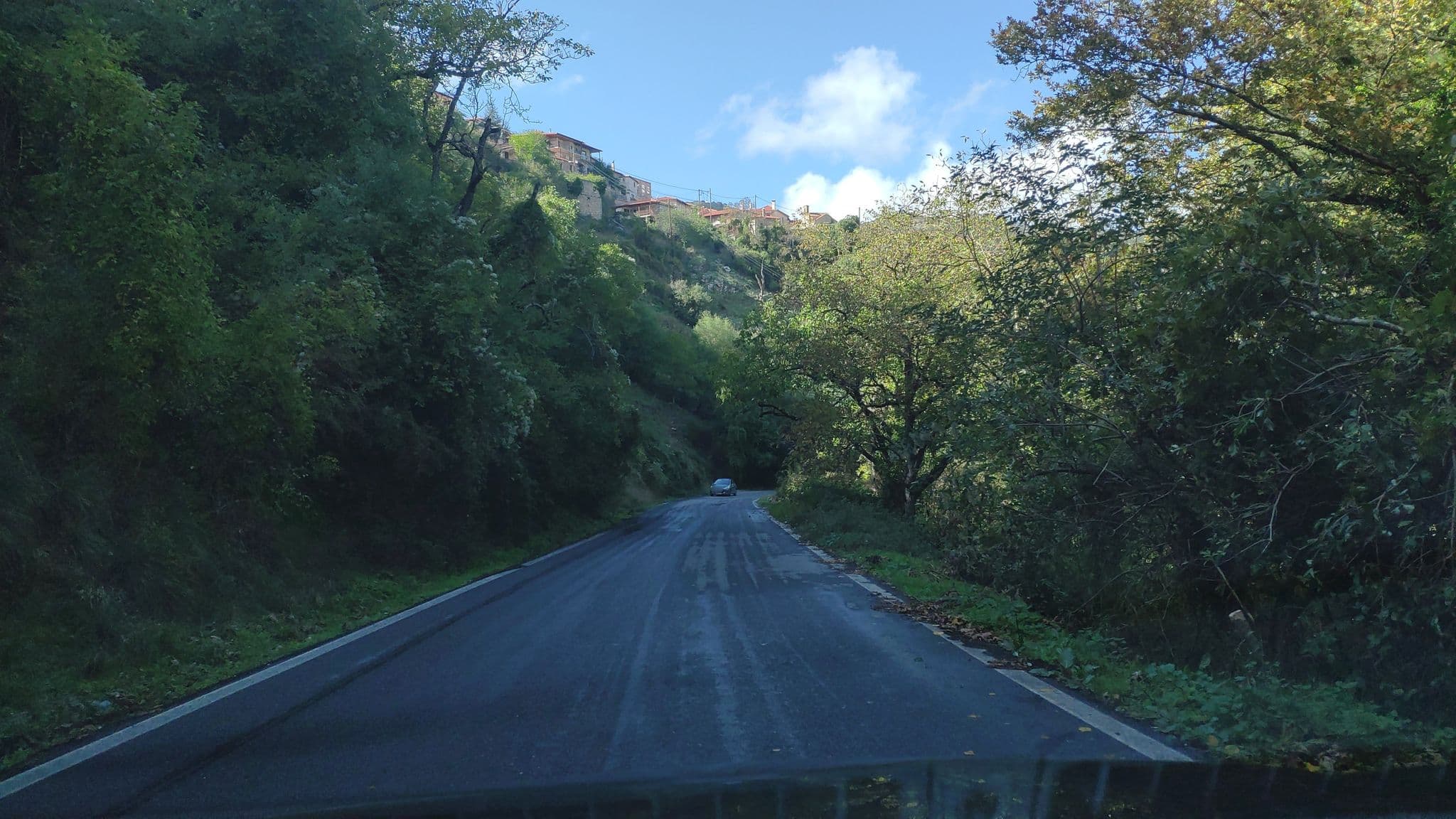 Street view near Ξενώνας Λούσιος, Trópaia — © pppetros (CC BY-SA · Mapillary)