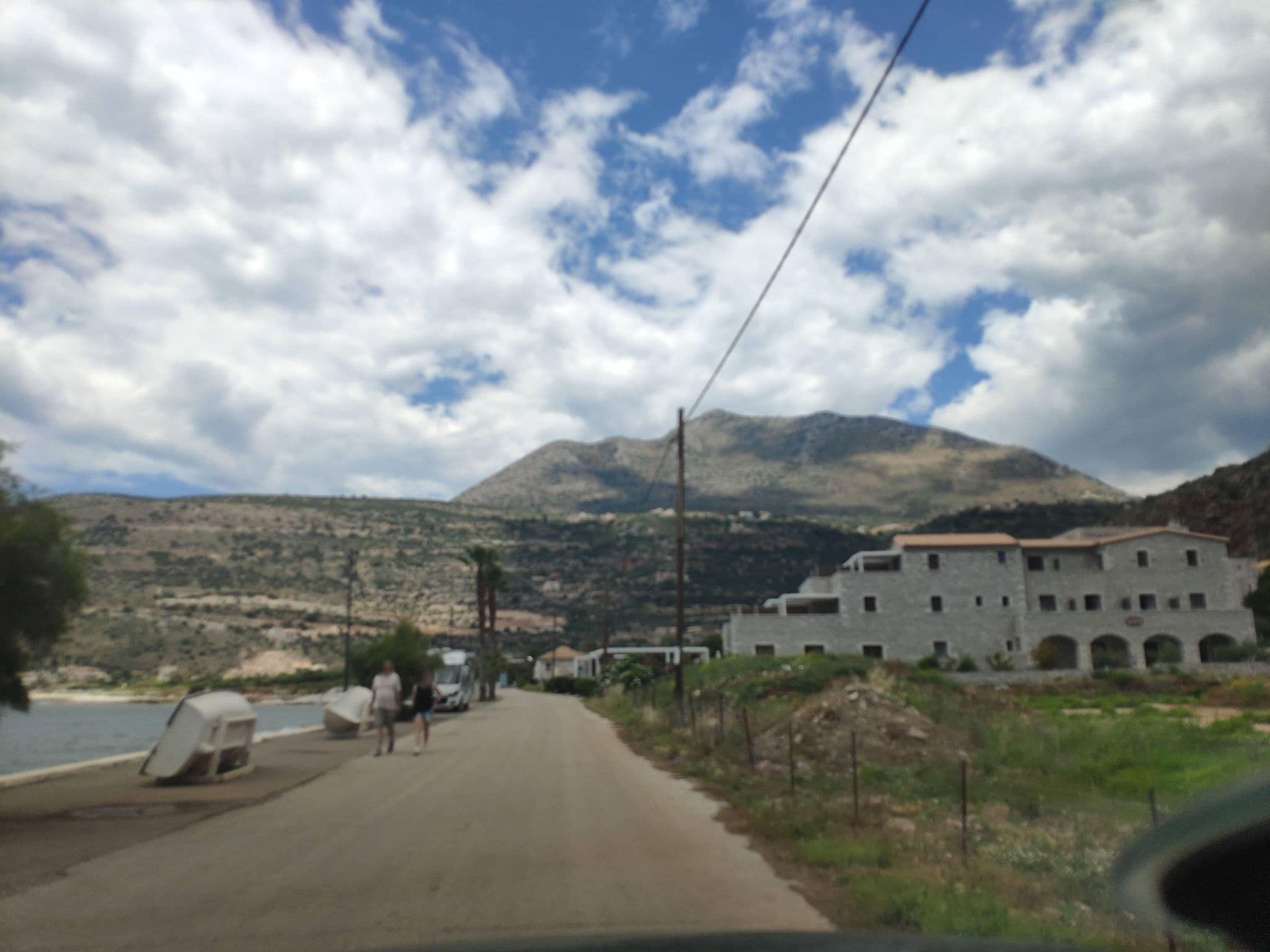 Street view near Vasilios Apartments Hotel, Oítilon — © pppetros (CC BY-SA · Mapillary)