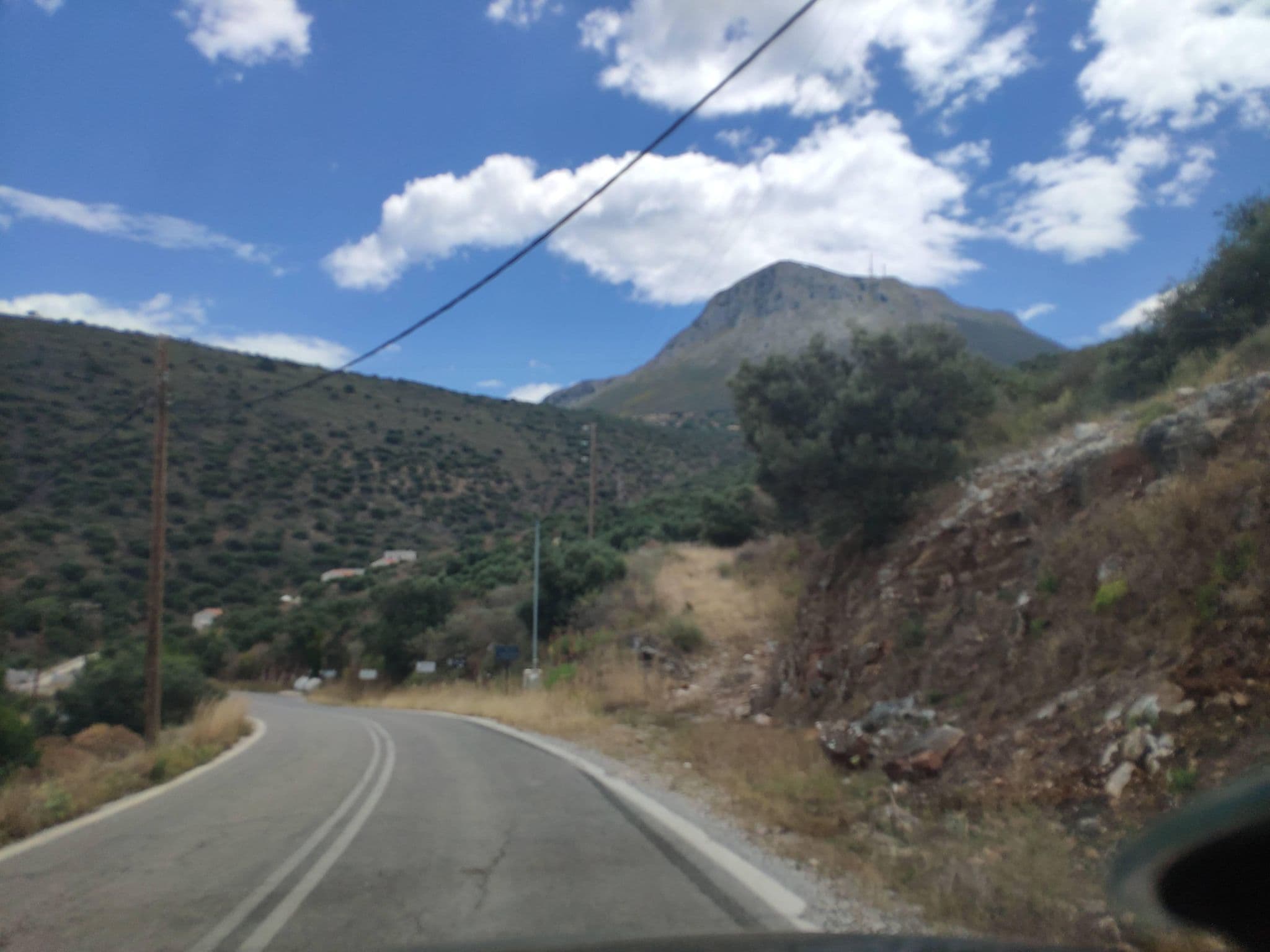 Street view near Trapela Luxury Suites, Oítilon — © pppetros (CC BY-SA · Mapillary)