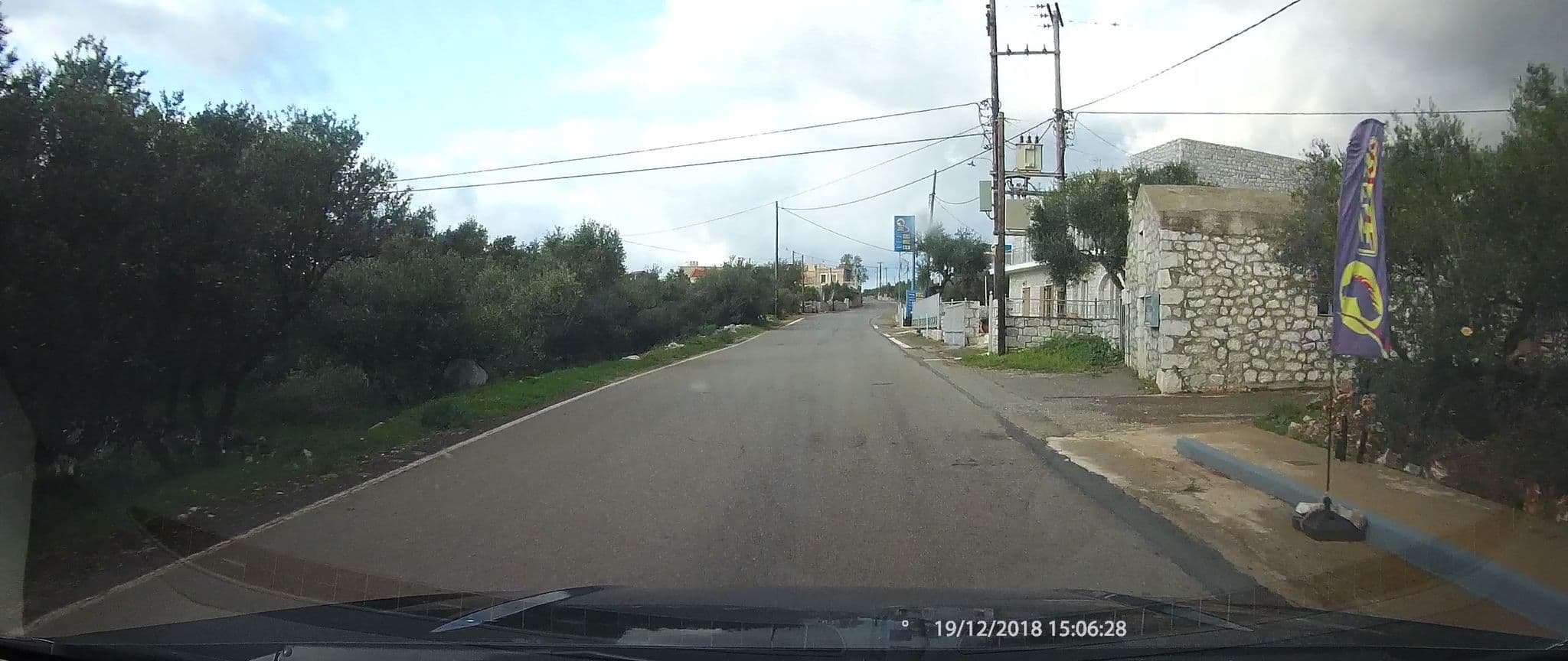 Street view near Kafiona Guesthouse, Oítilon — © healixx (CC BY-SA · Mapillary)