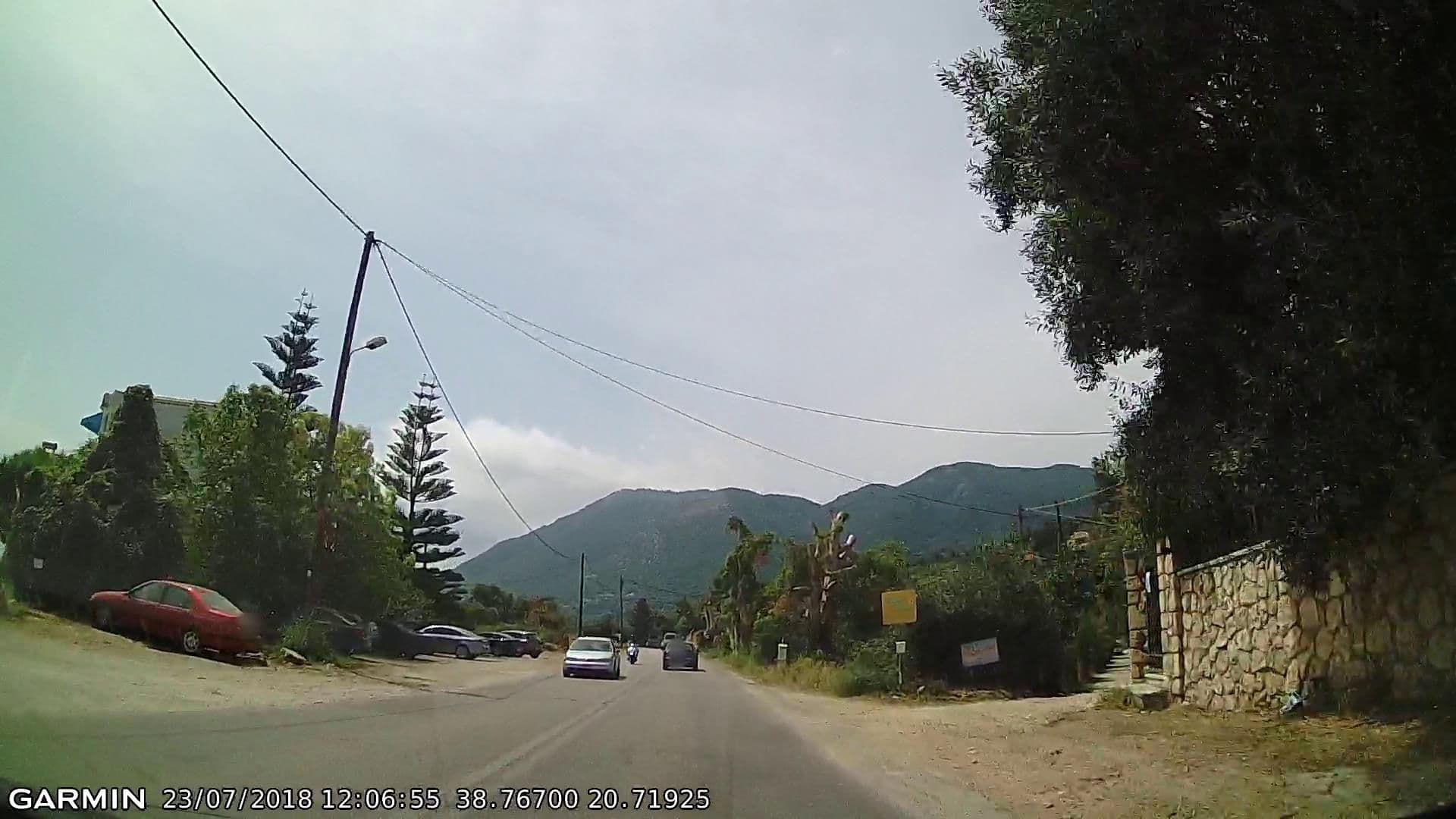 Street view near Ionion Hotel, Nidhríon — © pppetros (CC BY-SA · Mapillary)
