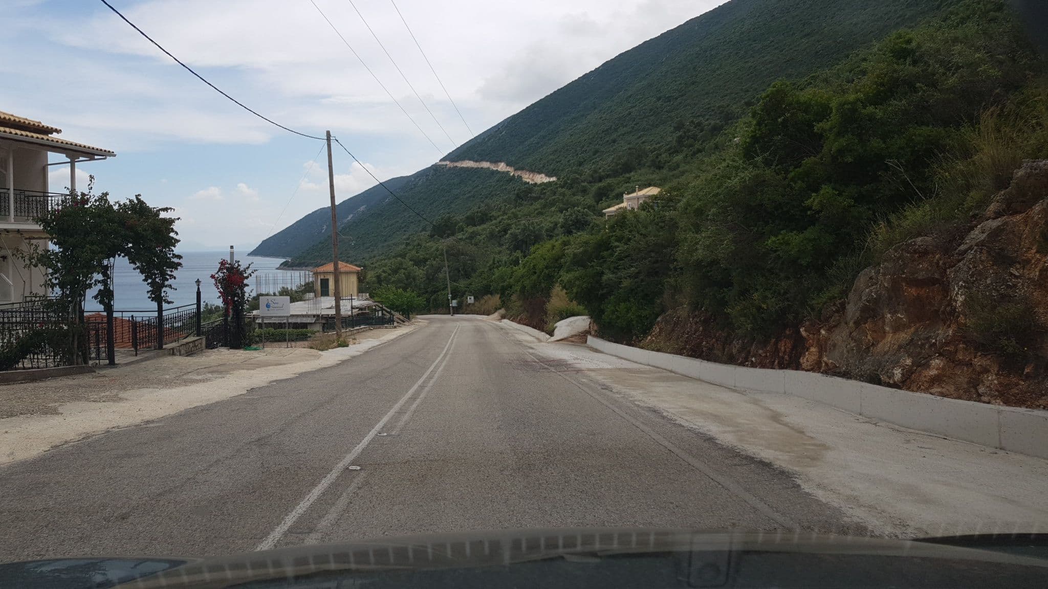 Street view near Stefani Studios & Apartments, Nidhríon — © roadroid (CC BY-SA · Mapillary)