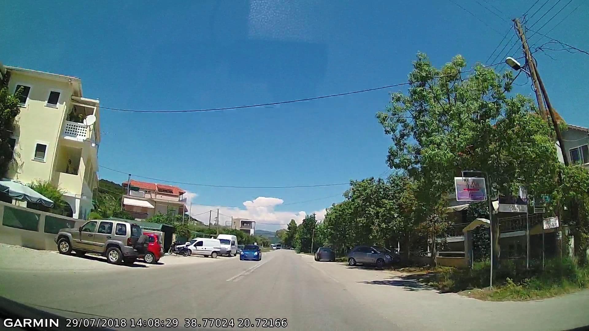 Street view near Villa Thomais, Nidhríon — © pppetros (CC BY-SA · Mapillary)