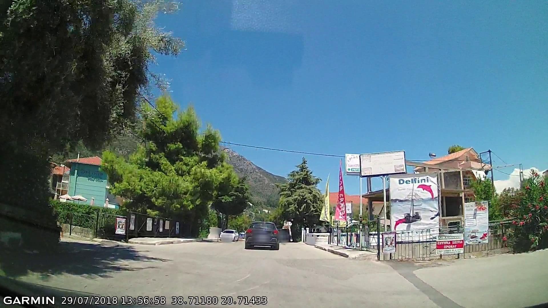 Street view near Borsalino Studios, Nidhríon — © pppetros (CC BY-SA · Mapillary)
