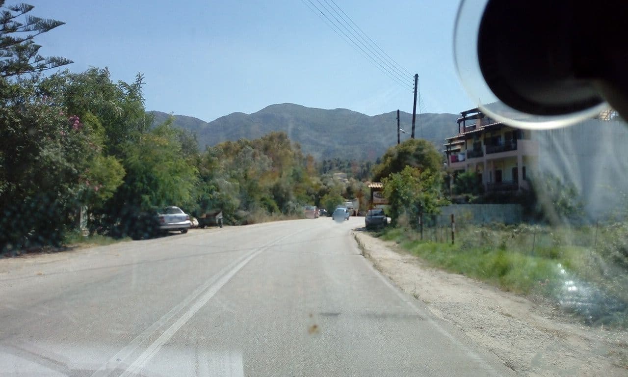Street view near Studios Irini, Nidhríon — © cascafico (CC BY-SA · Mapillary)