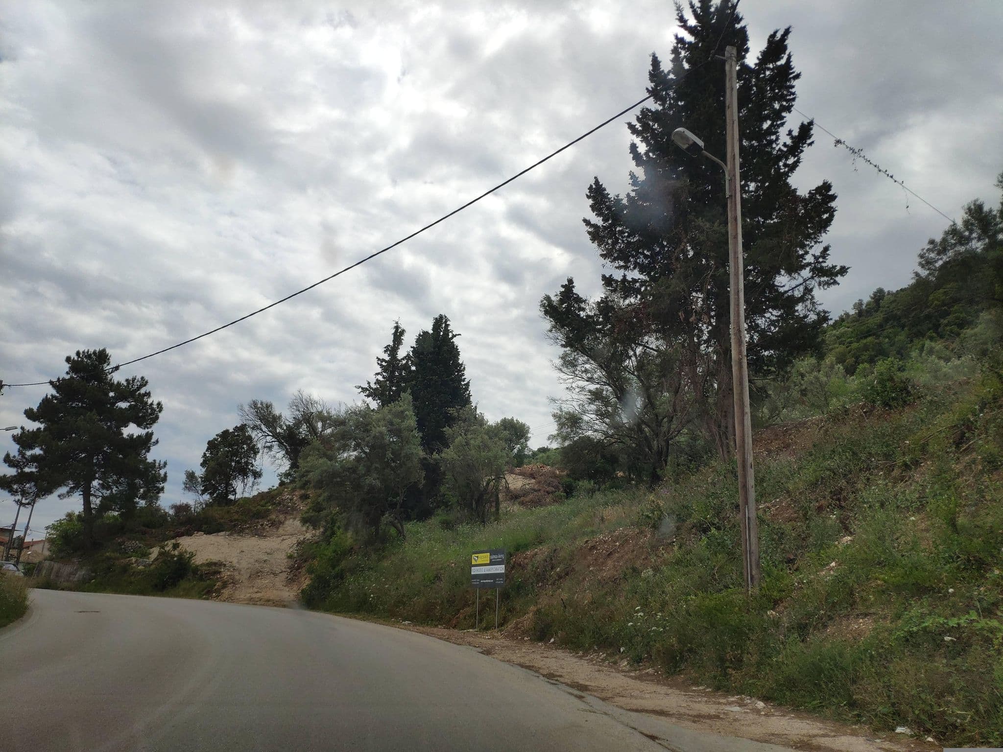 Street view near Ionian Melody, Nidhríon — © pppetros (CC BY-SA · Mapillary)