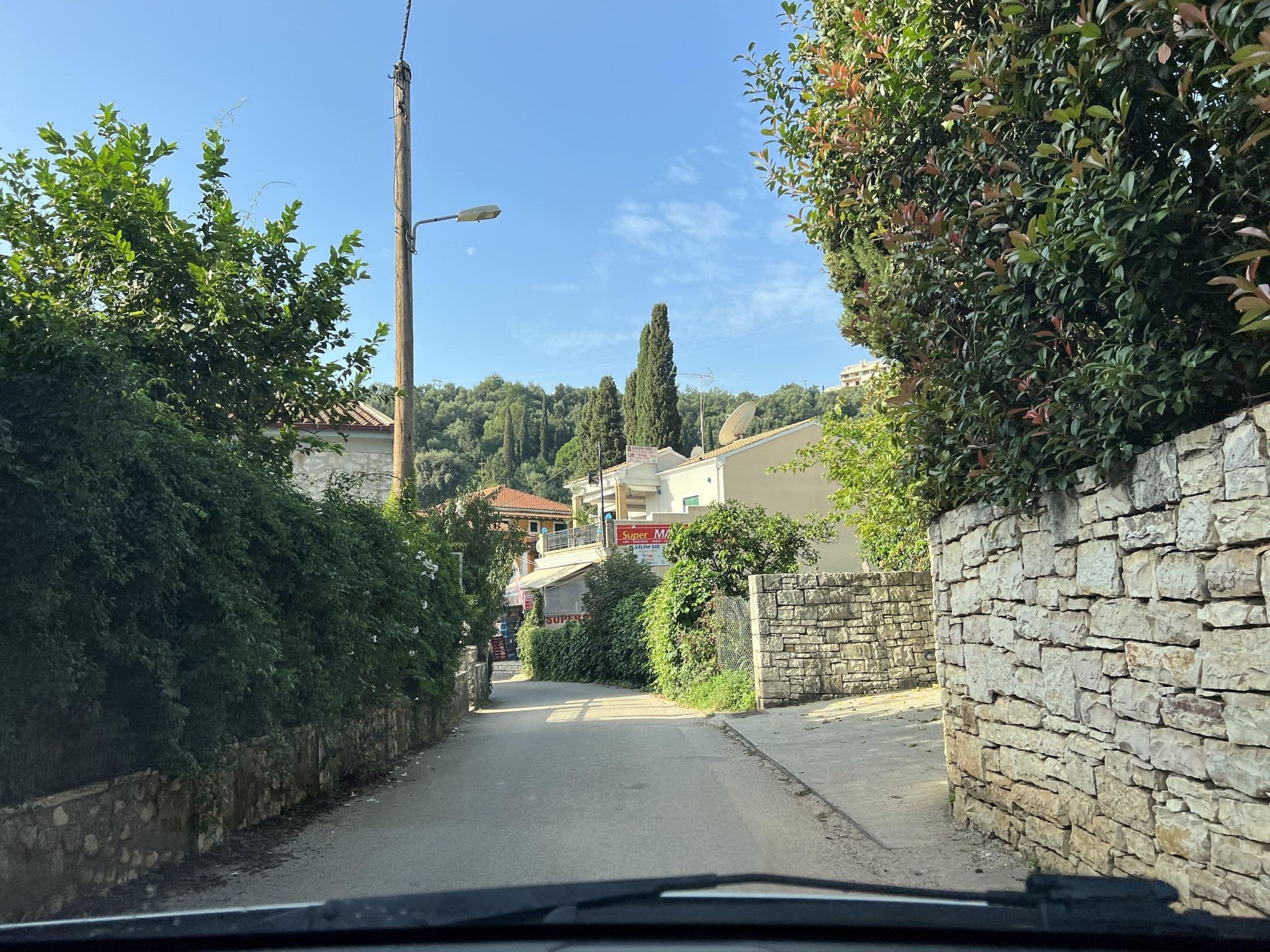 Street view near Erkina Villas, Acharávi — © VMConsulting (CC BY-SA · Mapillary)