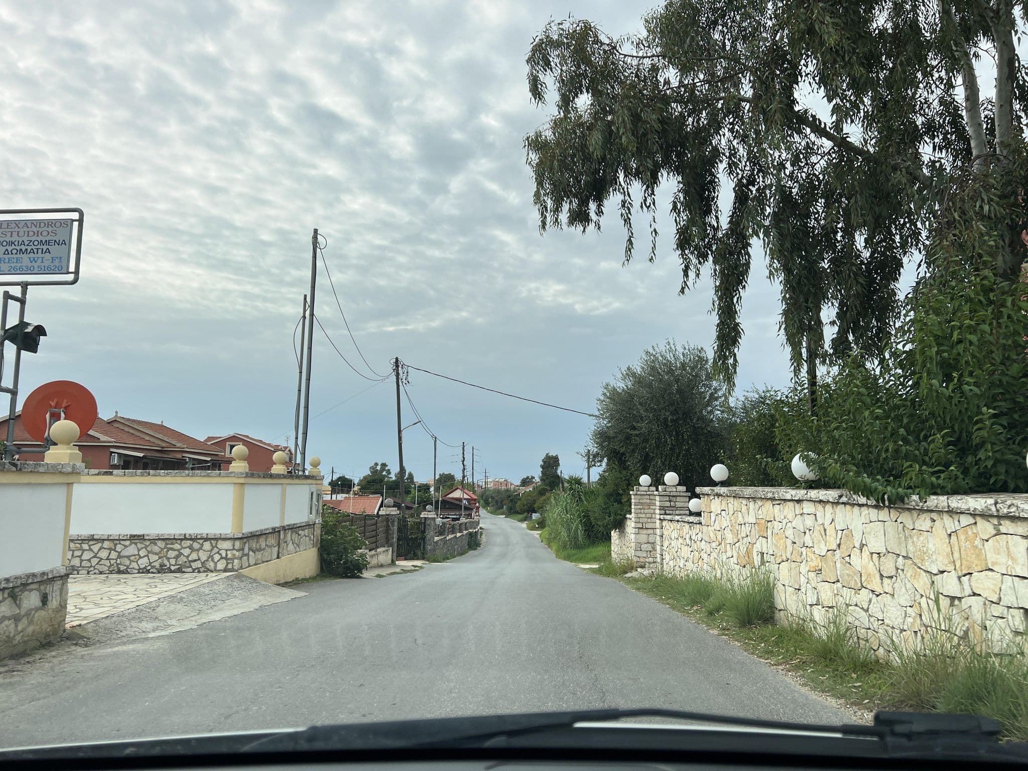 Street view near Alexandros Studios, Agios Georgis — © VMConsulting (CC BY-SA · Mapillary)