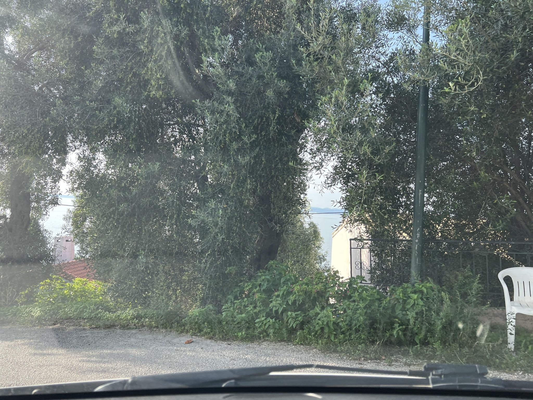 Street view near Villa Ariadni, Nýmfes — © VMConsulting (CC BY-SA · Mapillary)