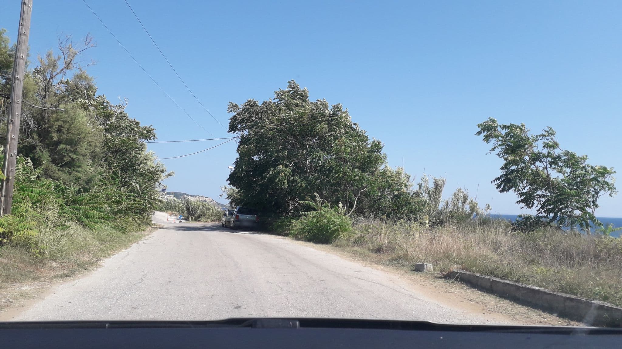 Street view near Pansion Νίκος και Βιβη, Perivóli — © dli (CC BY-SA · Mapillary)
