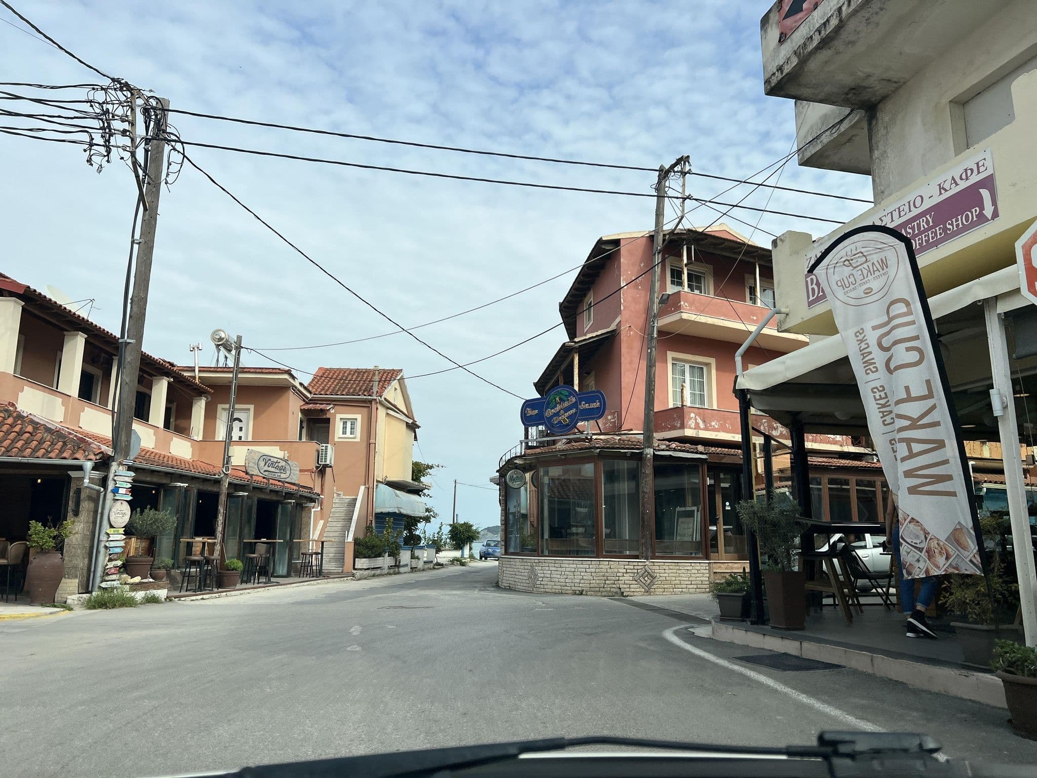 Street view near Rebecca's Village, Agios Georgis — © VMConsulting (CC BY-SA · Mapillary)