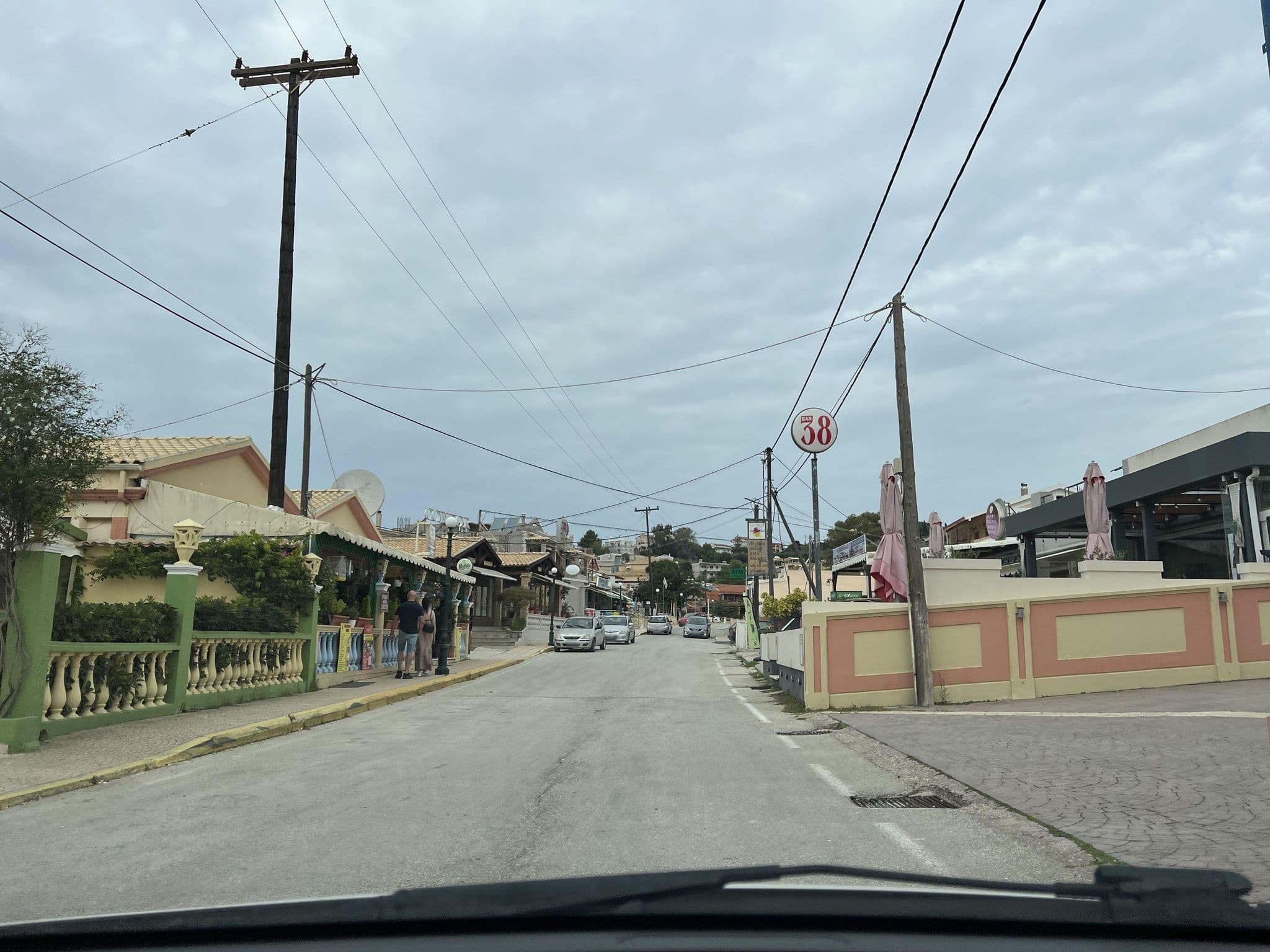 Street view near Thomas Bay Hotel, Agios Georgis — © VMConsulting (CC BY-SA · Mapillary)