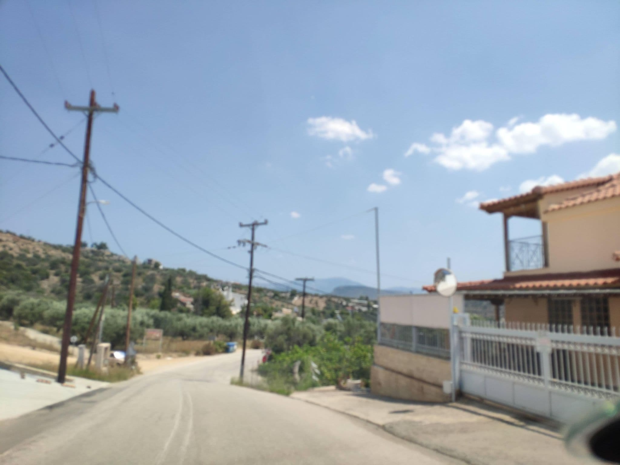 Street view near Iliana Apartments, Tolón — © pppetros (CC BY-SA · Mapillary)