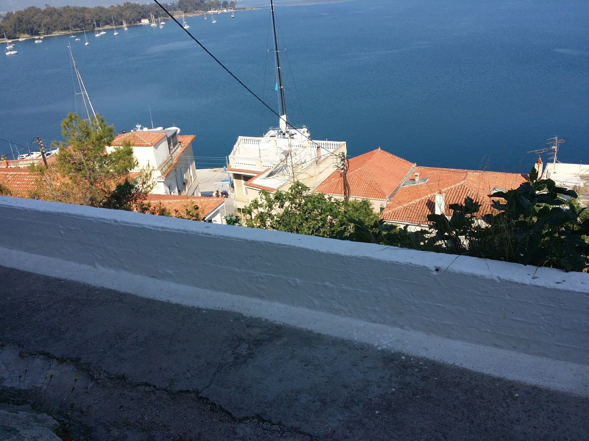 Street view near Sto Roloi Villas and Apartments, Póros — © pppetros (CC BY-SA · Mapillary)