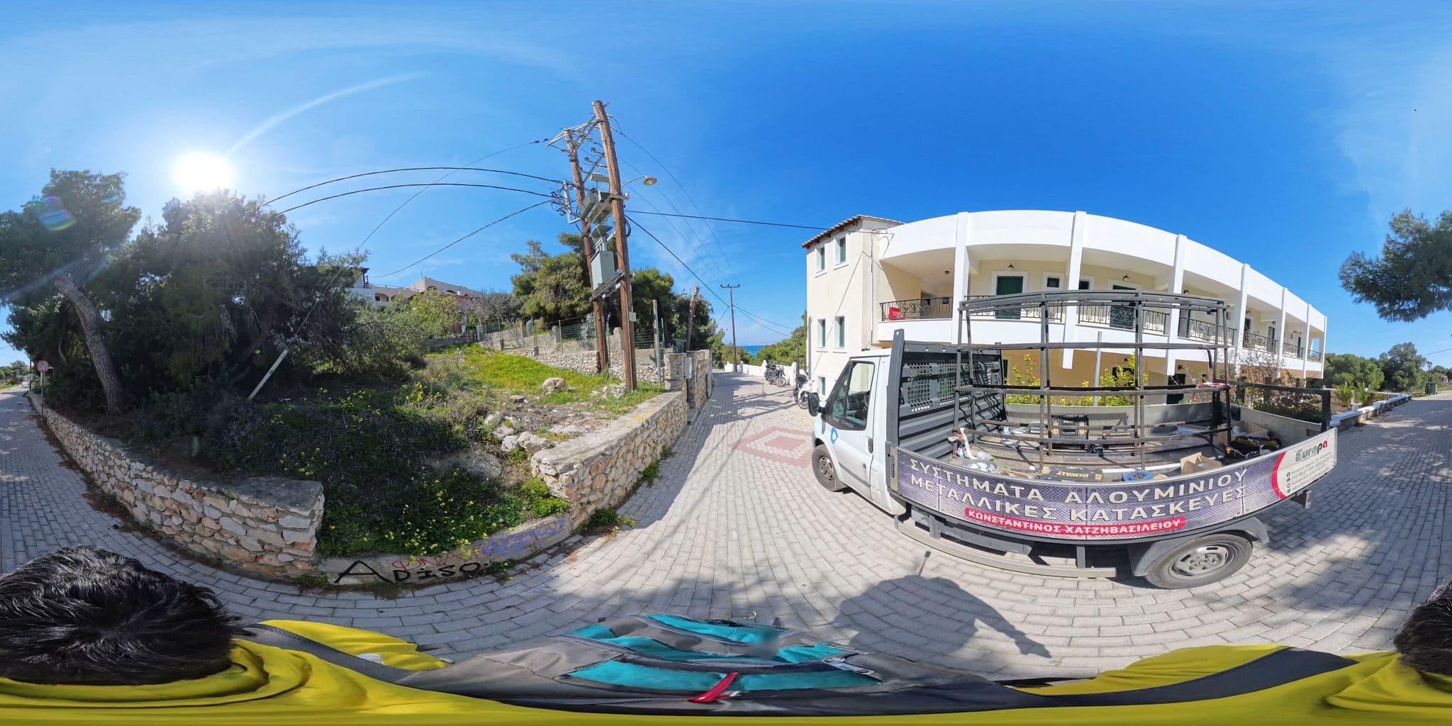 Street view near Dionysos Hotel, Agkístri — © NickGar (CC BY-SA · Mapillary)