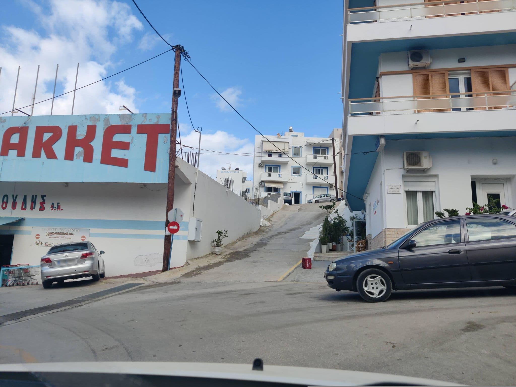 Street view near Titania Hotel, Karpathos — © kietlak (CC BY-SA · Mapillary)