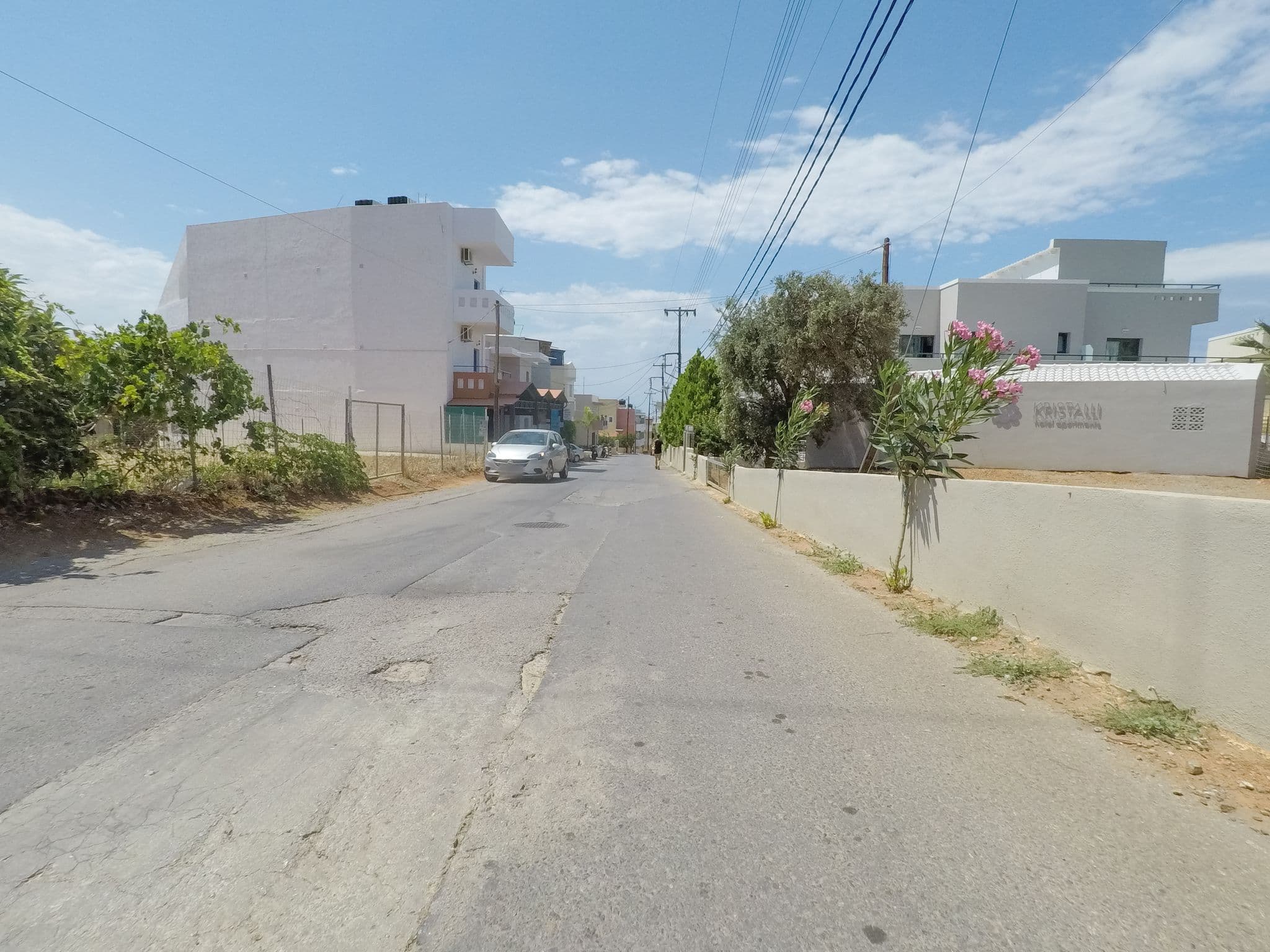 Street view near Kristalli Hotel Apartments, Mália — © esario (CC BY-SA · Mapillary)