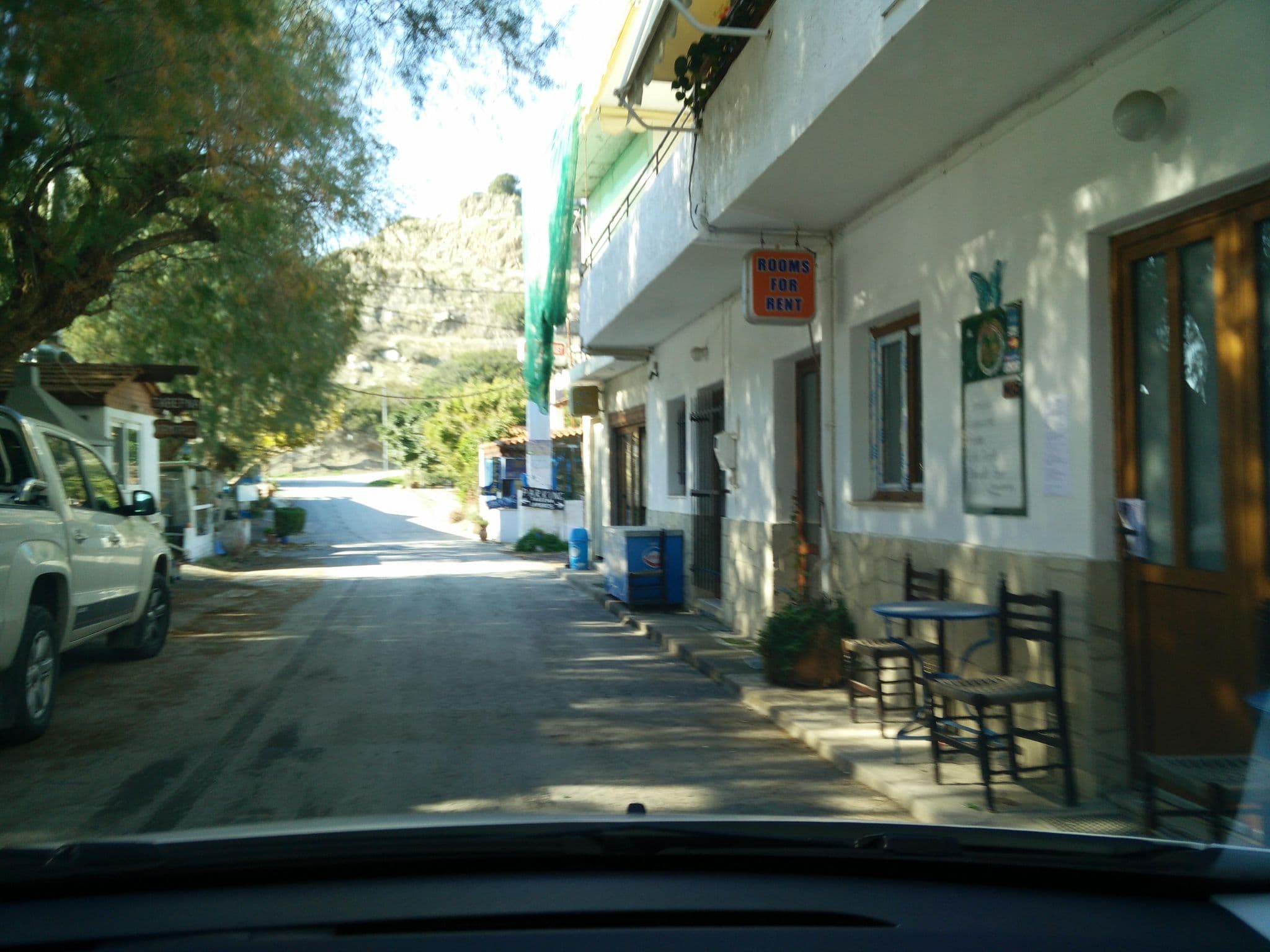 Street view near Lambros rooms for rent, Néa Anatolí — © pelgrim (CC BY-SA · Mapillary)