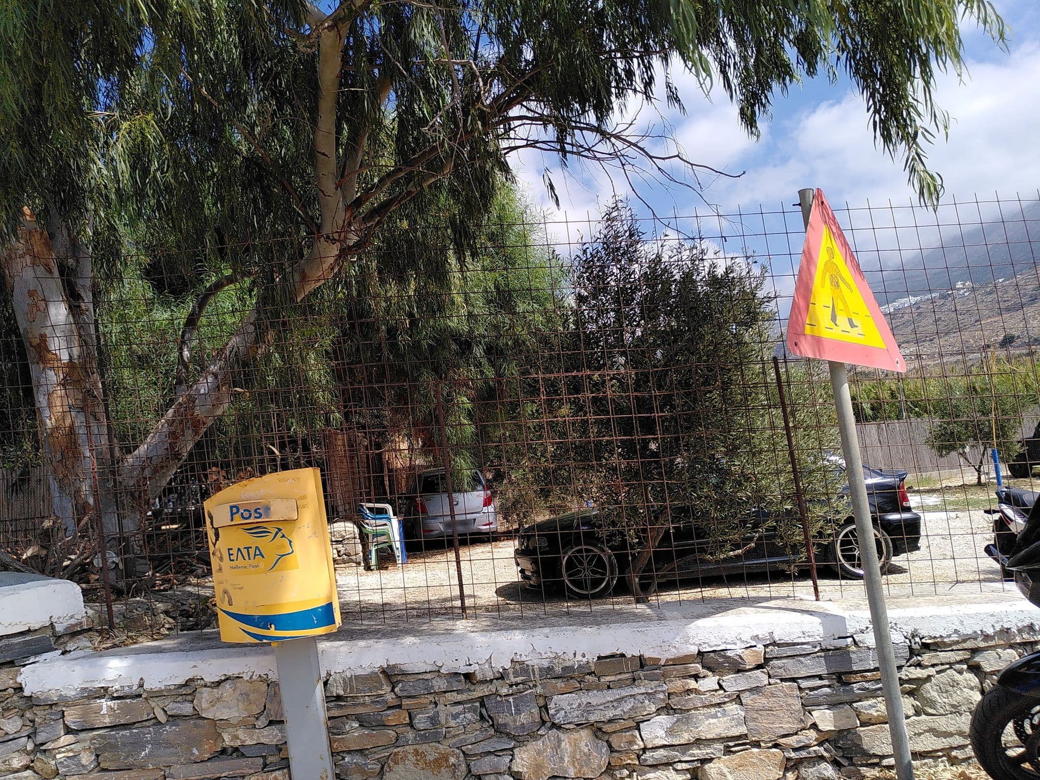 Street view near Petradi Apartments, Filótion — © kibour (CC BY-SA · Mapillary)