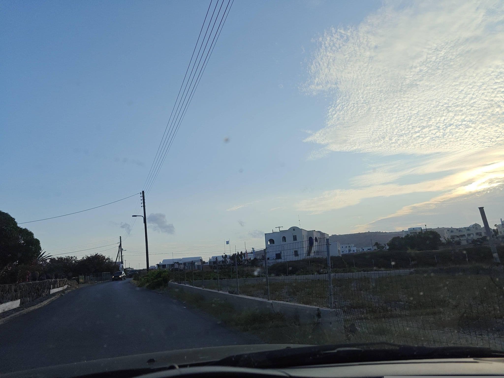 Street view near Perivolos Studio Apartments, Emporeío — © grkpete (CC BY-SA · Mapillary)