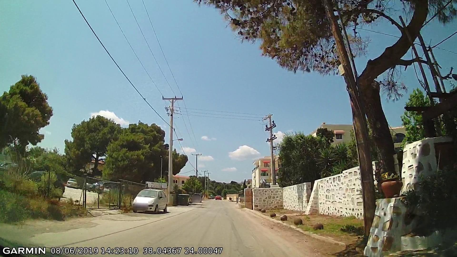 Street view near Aquis Aquamarine Hotel, Neos Voutzás — © pppetros (CC BY-SA · Mapillary)