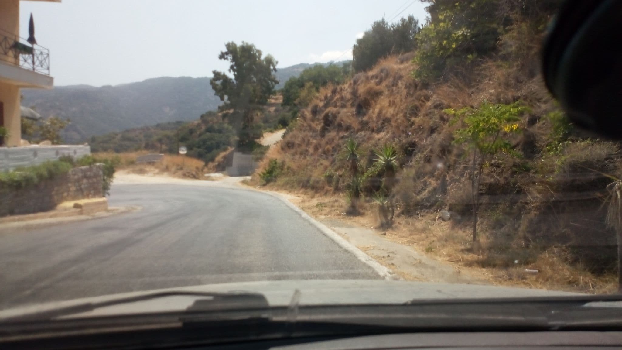 Street view near Nafkrati Pansion, Agios Kirykos — © vaspag (CC BY-SA · Mapillary)