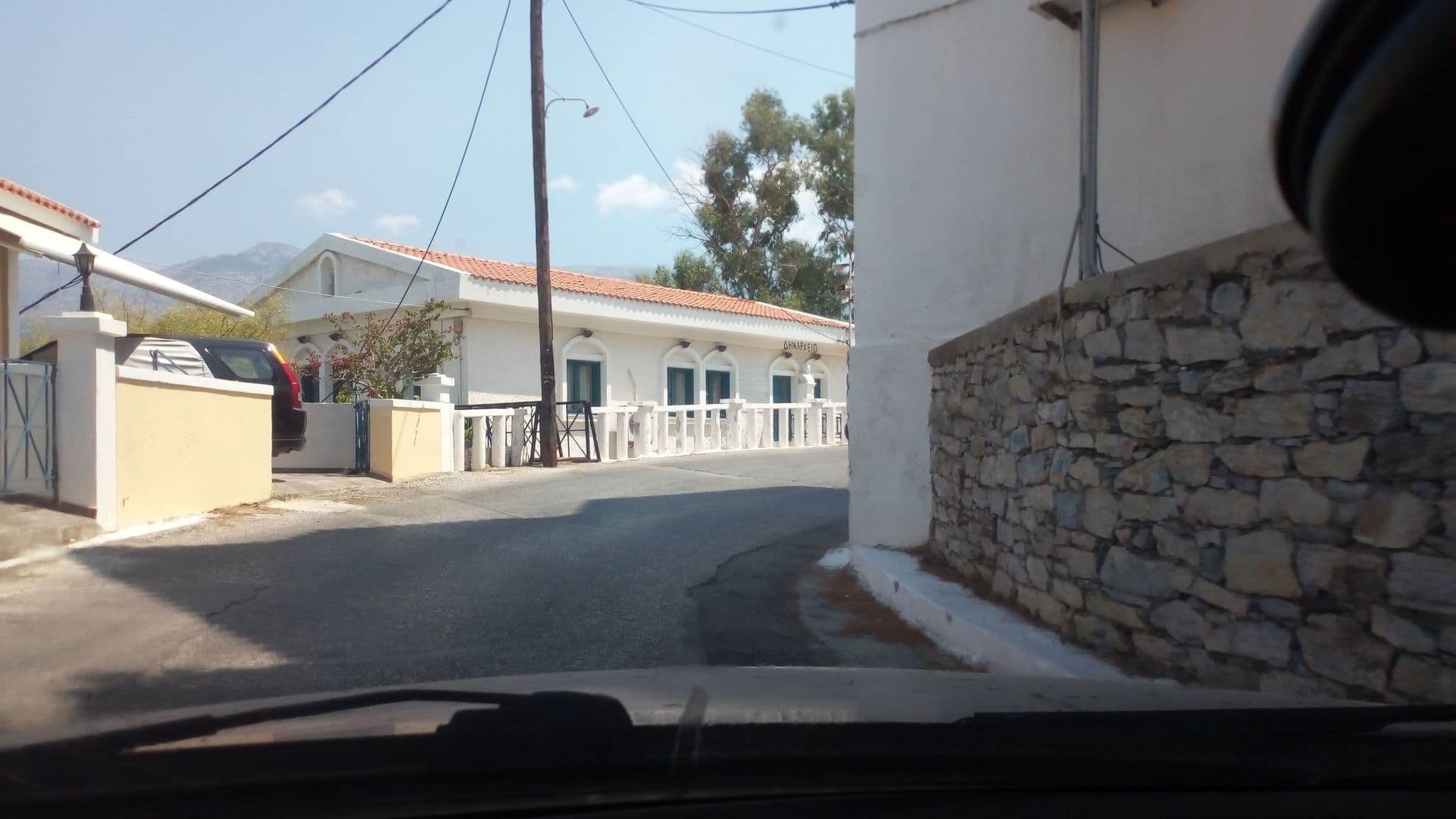Street view near Eudoxia Hotel, Agios Kirykos — © vaspag (CC BY-SA · Mapillary)