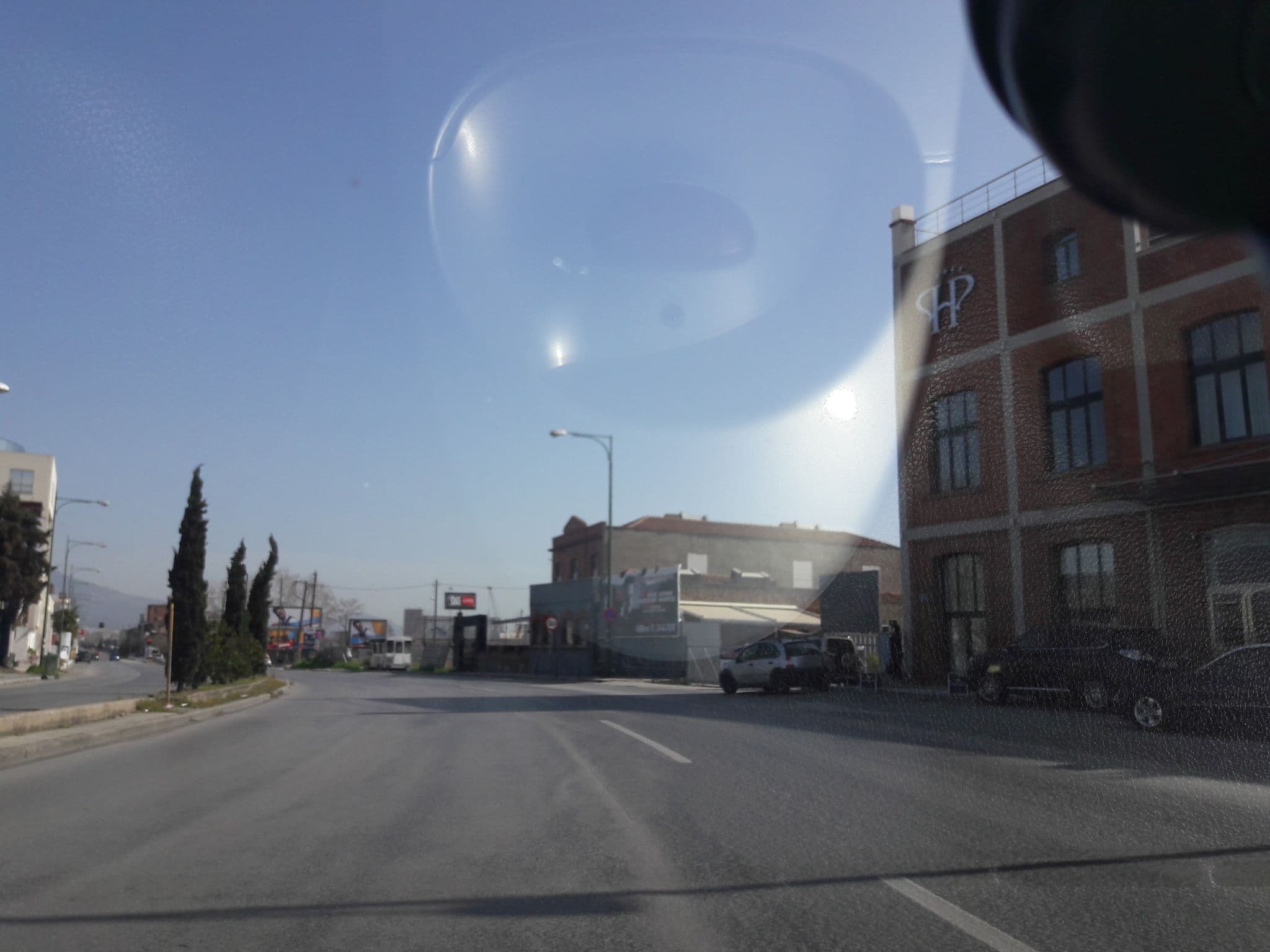 Street view near Porto Palace Hotel & Conference Center, Meneméni — © giannis (CC BY-SA · Mapillary)