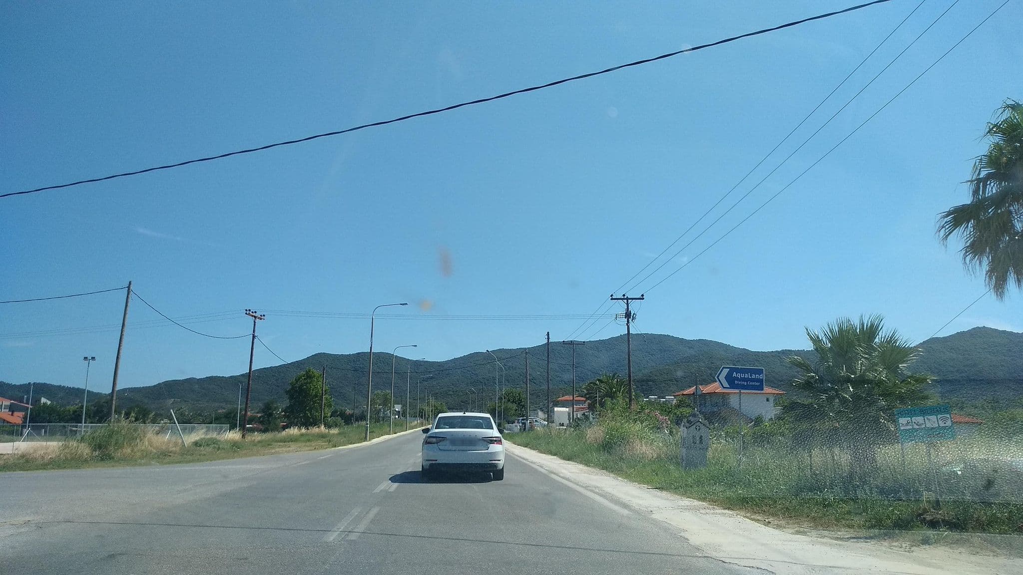 Street view near Rodon Garden, Sárti — © tavi (CC BY-SA · Mapillary)