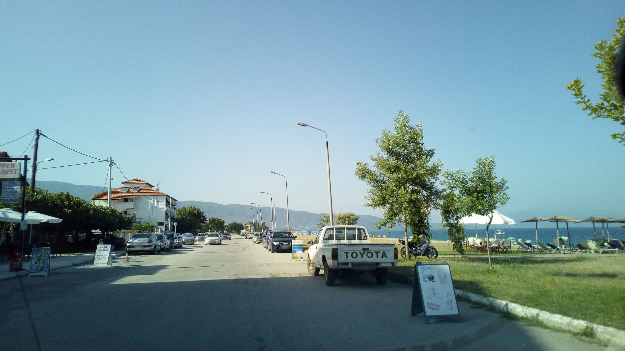 Street view near Diogenis Apartments, Néa Vrasná — © skarmoutsosv (CC BY-SA · Mapillary)