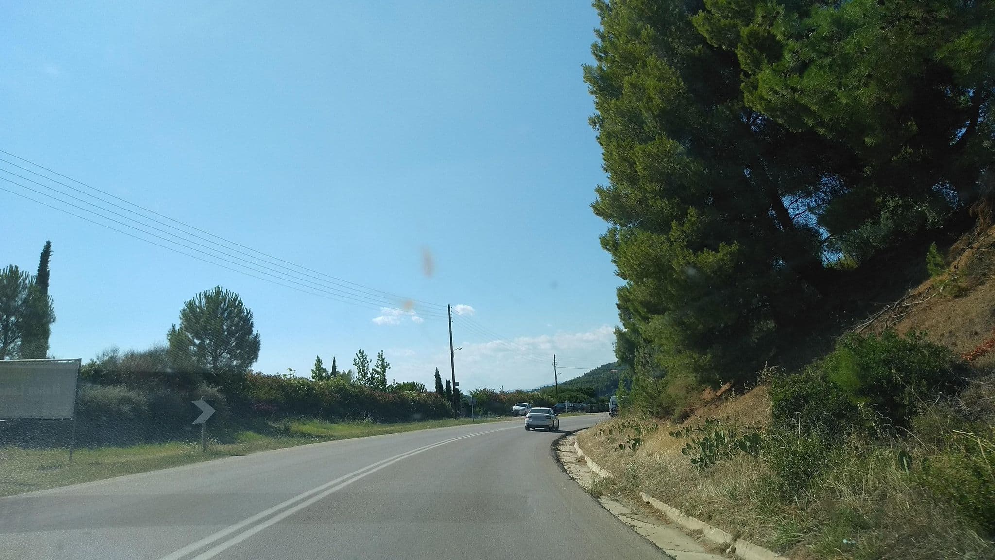 Street view near Helios Land Hotel, Néos Marmarás — © tavi (CC BY-SA · Mapillary)