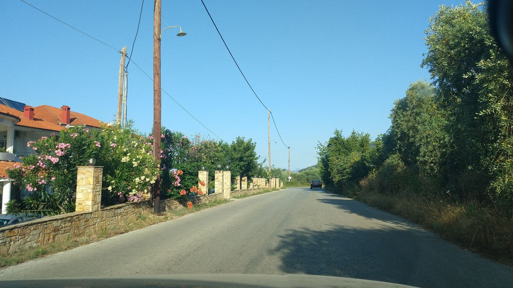 Street view near Hotel Achillion, Potamiá — © lucia_ (CC BY-SA · Mapillary)