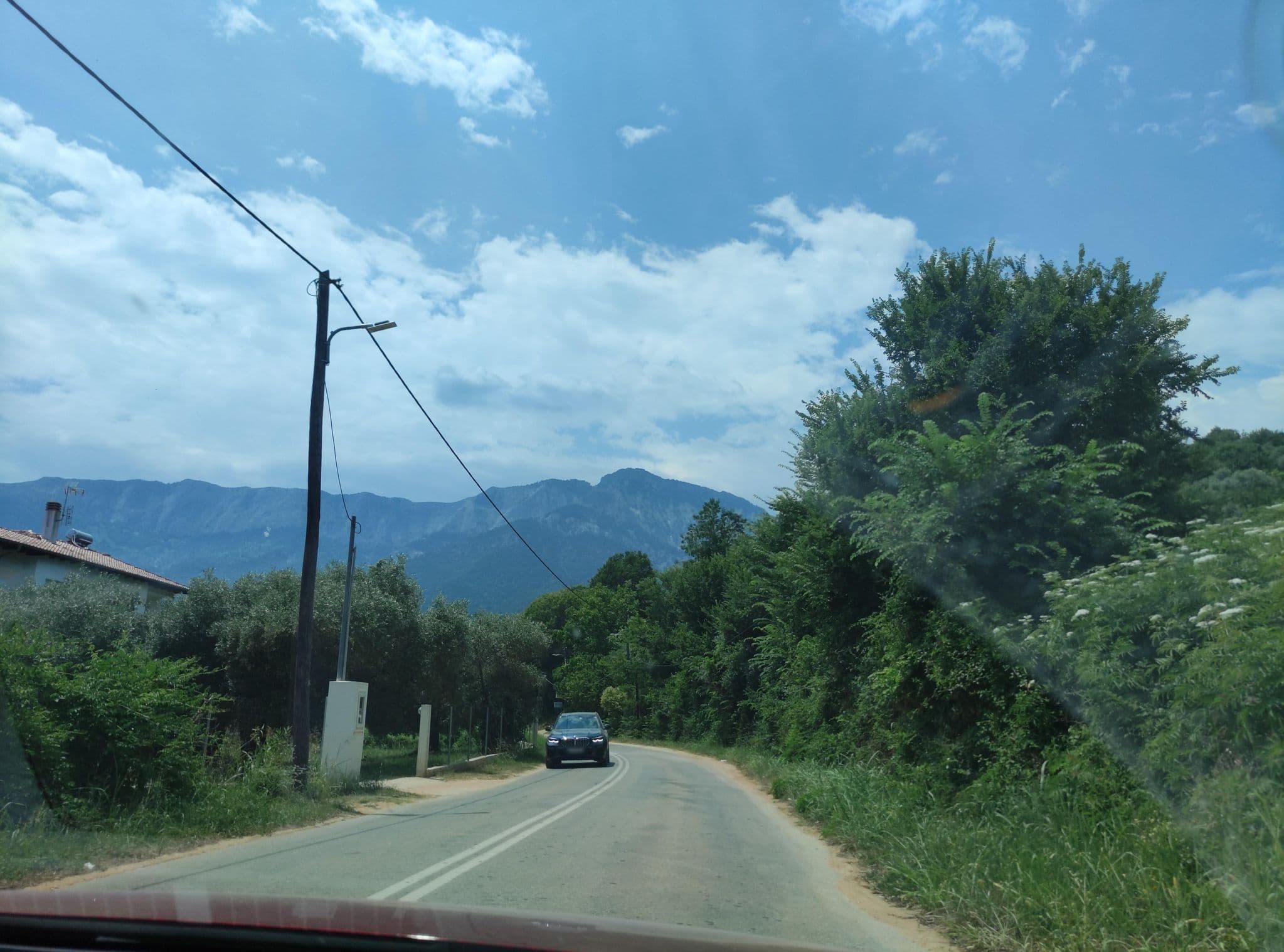 Street view near Corali Studios, Potamiá — © neau (CC BY-SA · Mapillary)