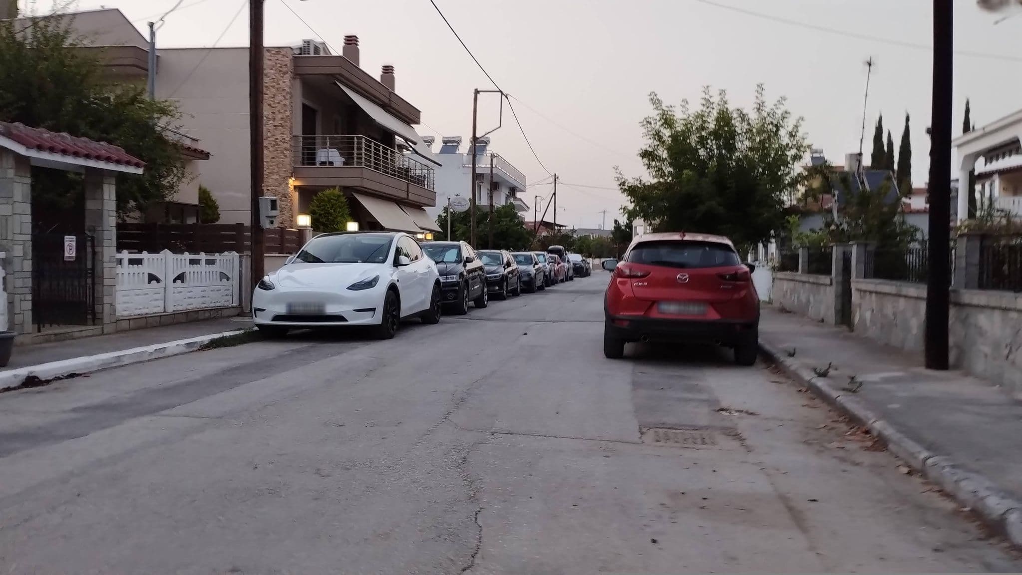 Street view near Sunset Luxury Apartments, Keramotí — © batvanyu (CC BY-SA · Mapillary)