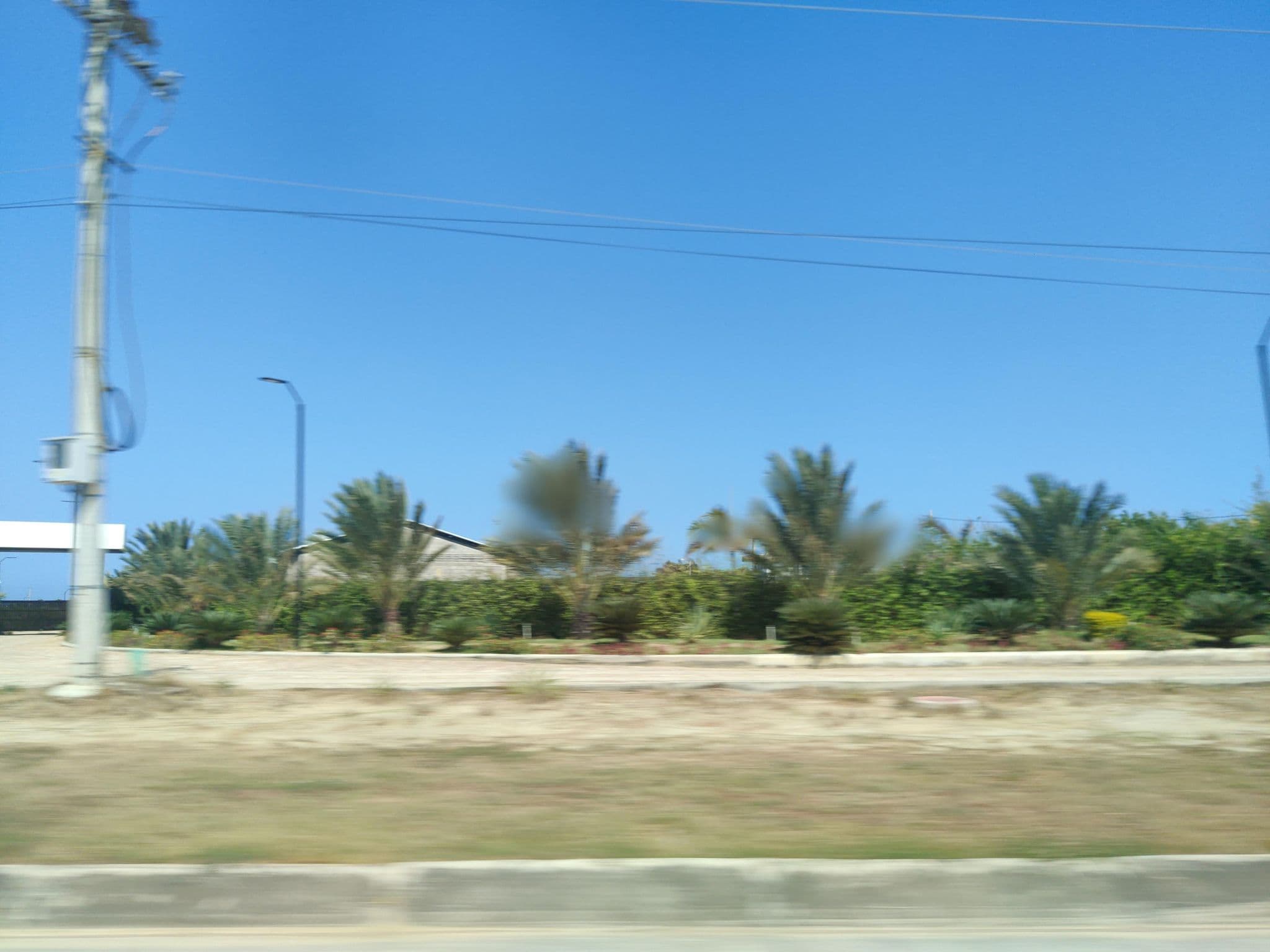 Street view near Ocean Club, Juan de Acosta — © tumblecow (CC BY-SA · Mapillary)