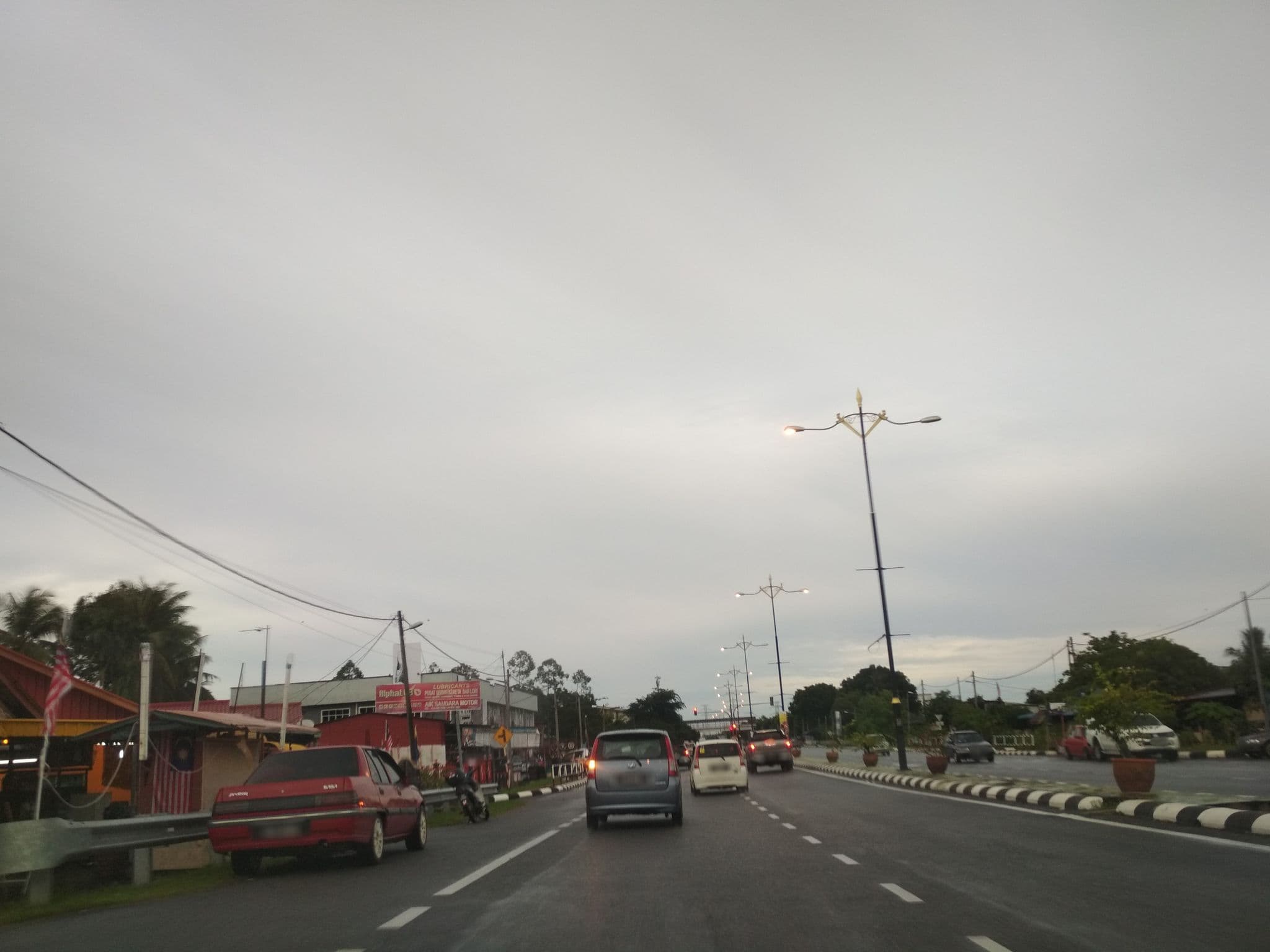 Street view near Che Azizah Homestay, Kangar — © aymanfit3 (CC BY-SA · Mapillary)
